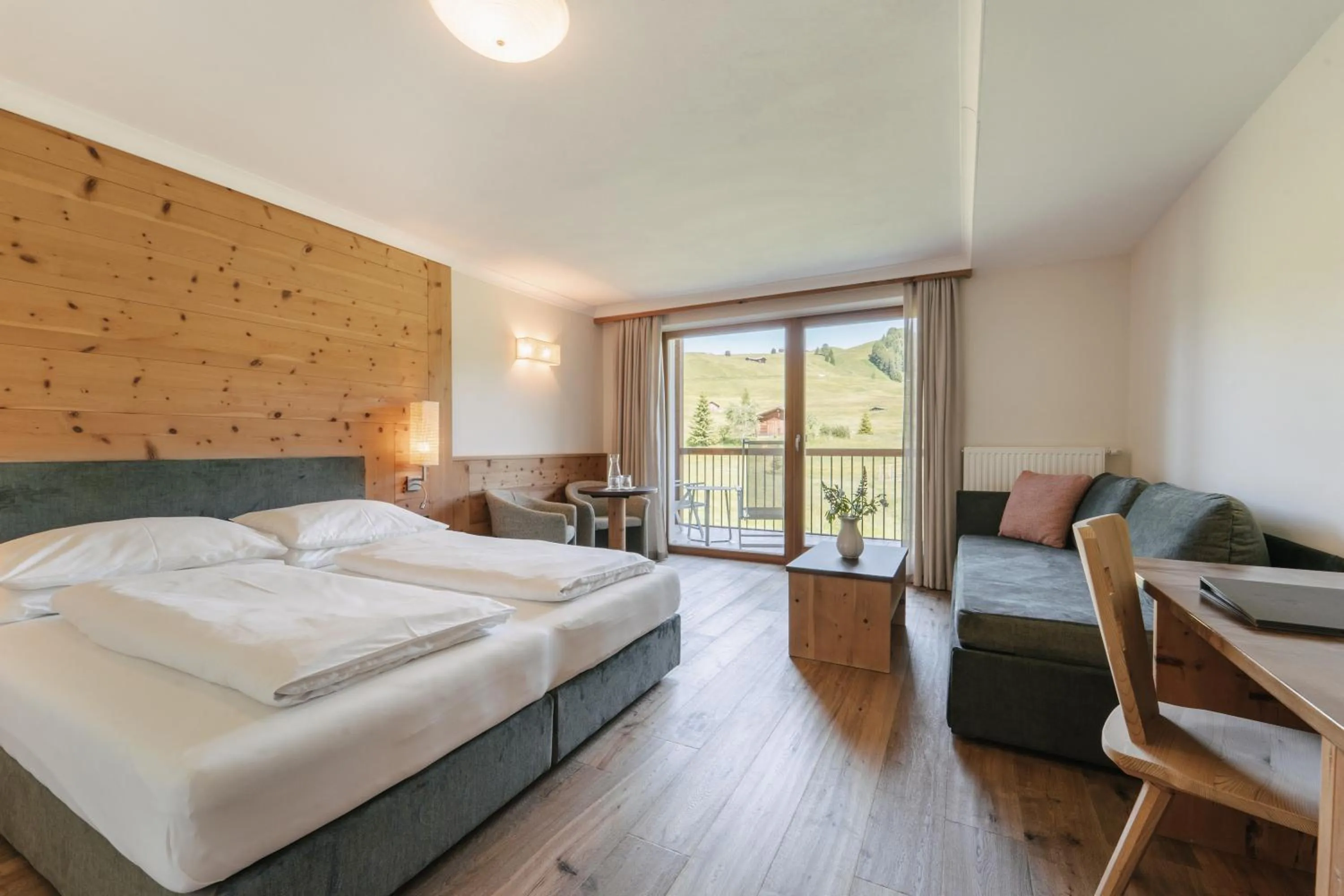 View (from property/room), Bed in Brunelle Seiser Alm Lodge