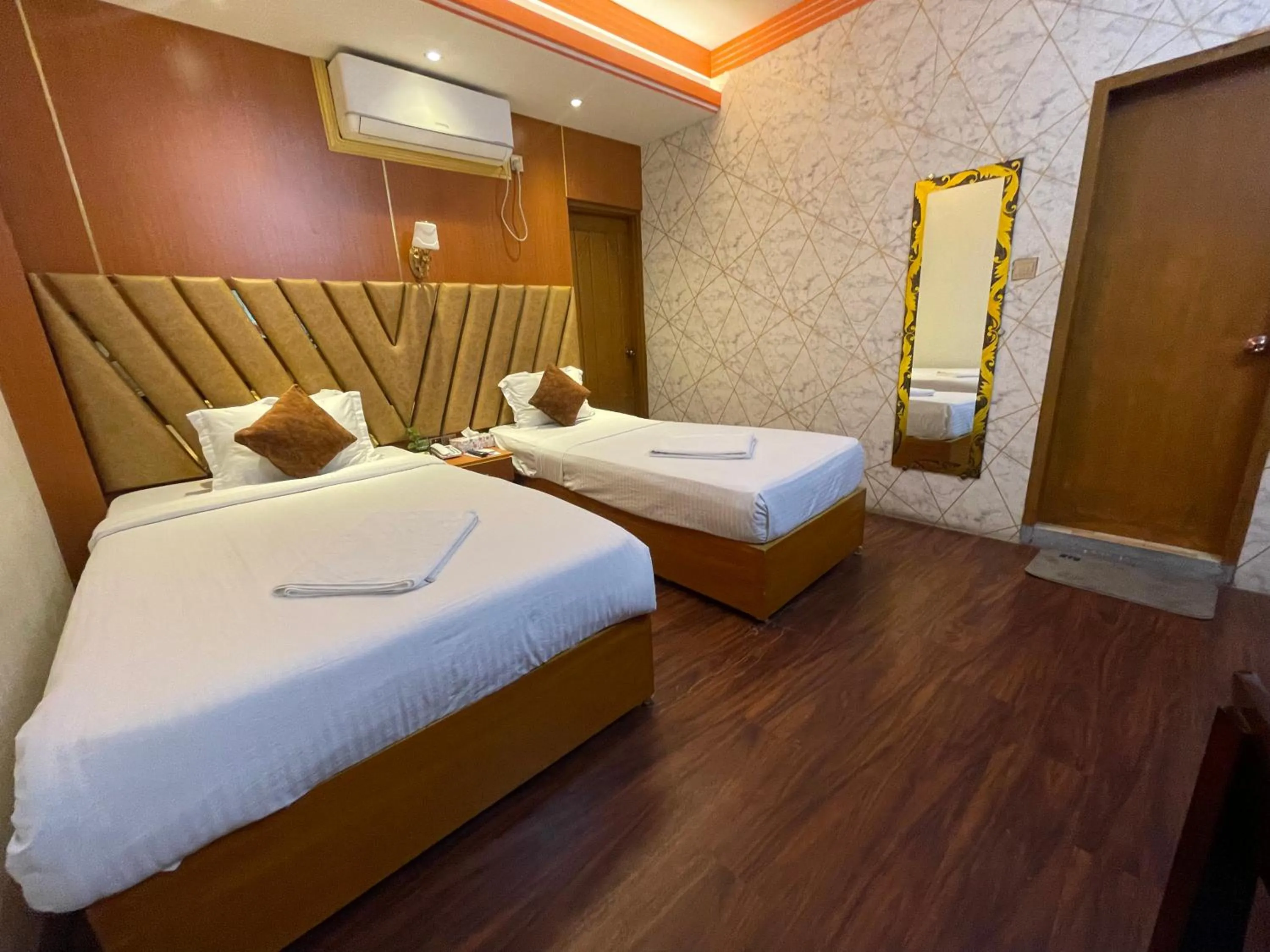 Bed in Hotel Rosewood Uttara