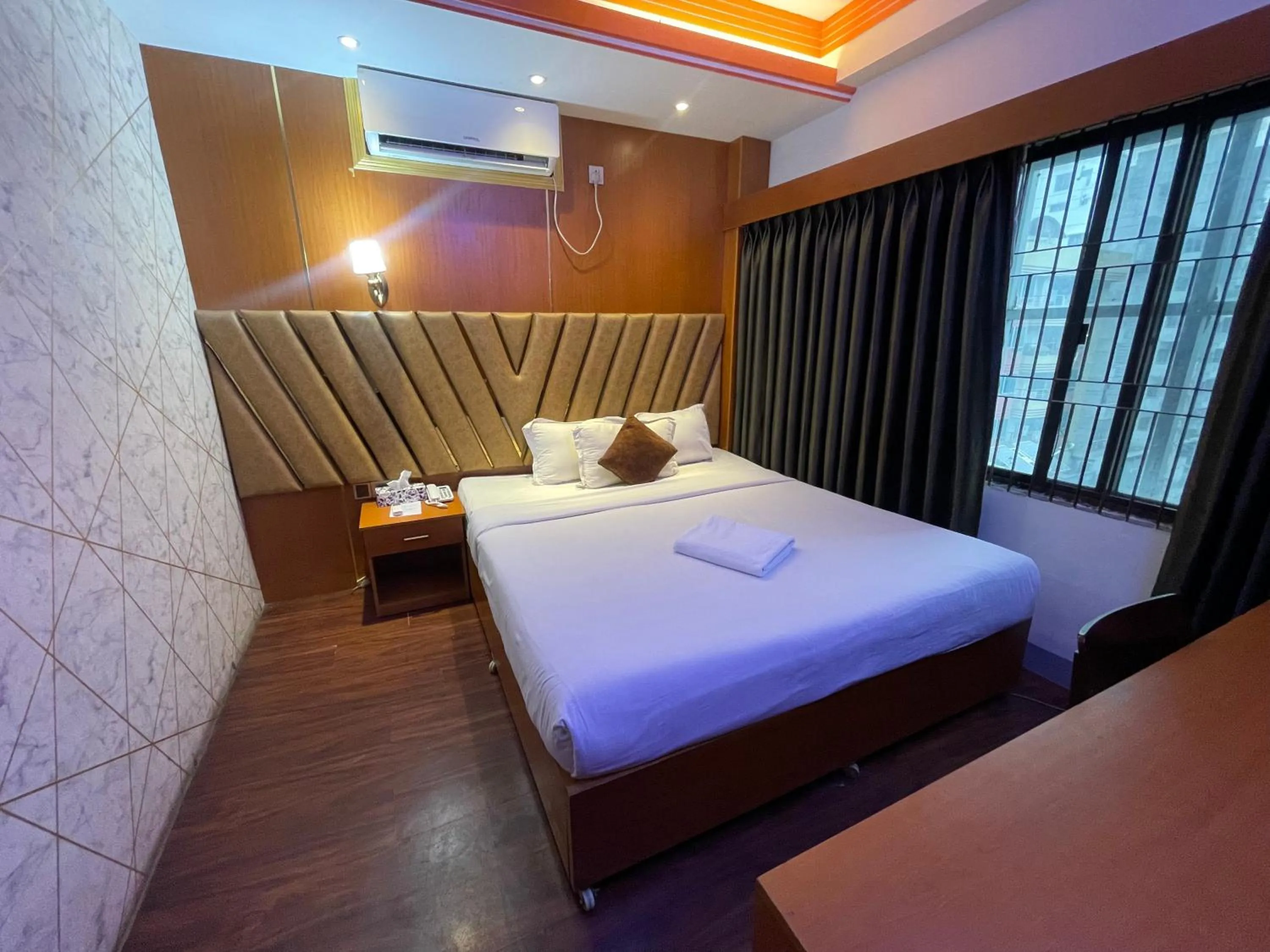Bed in Hotel Rosewood Uttara