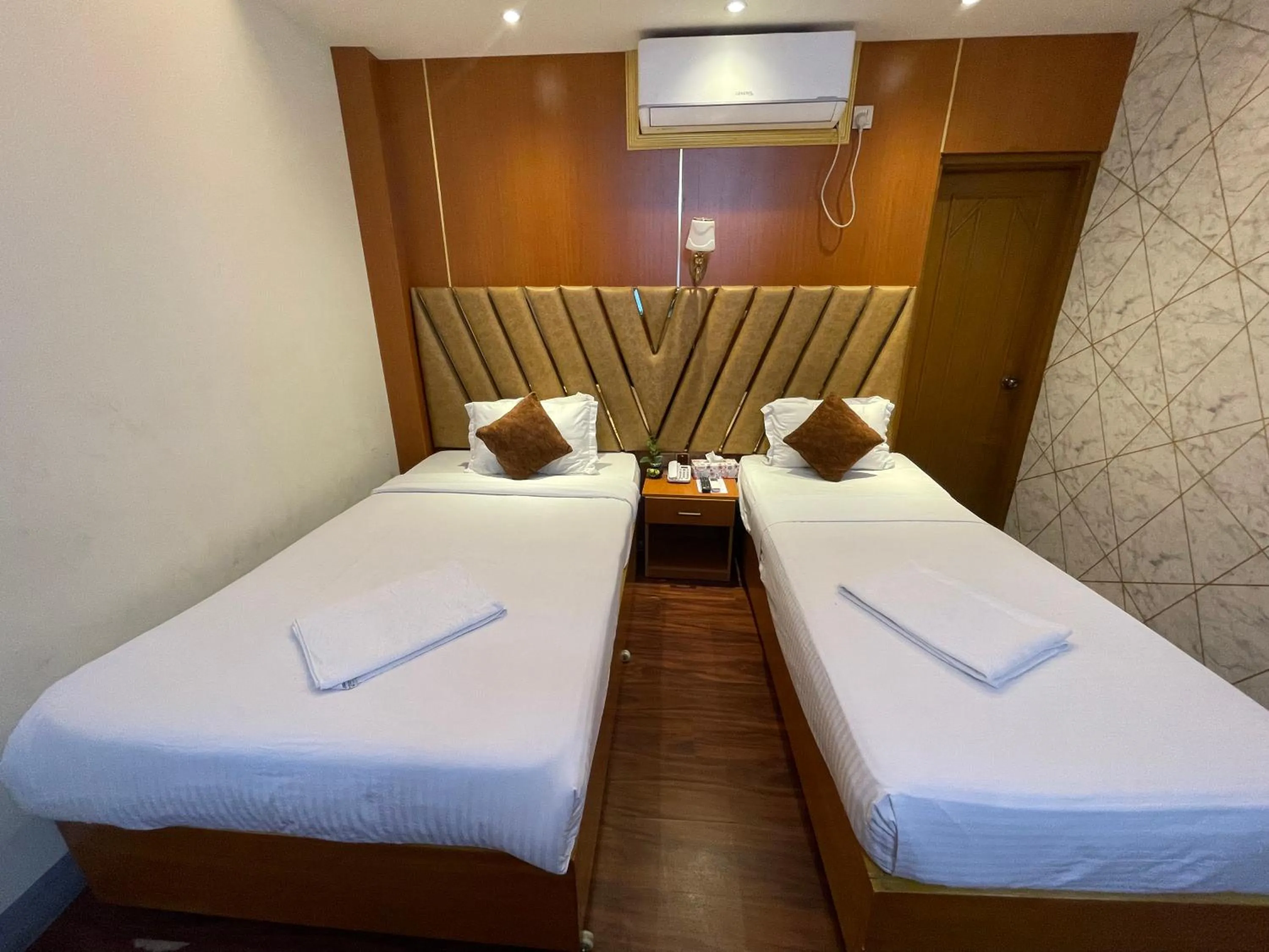 Bed in Hotel Rosewood Uttara