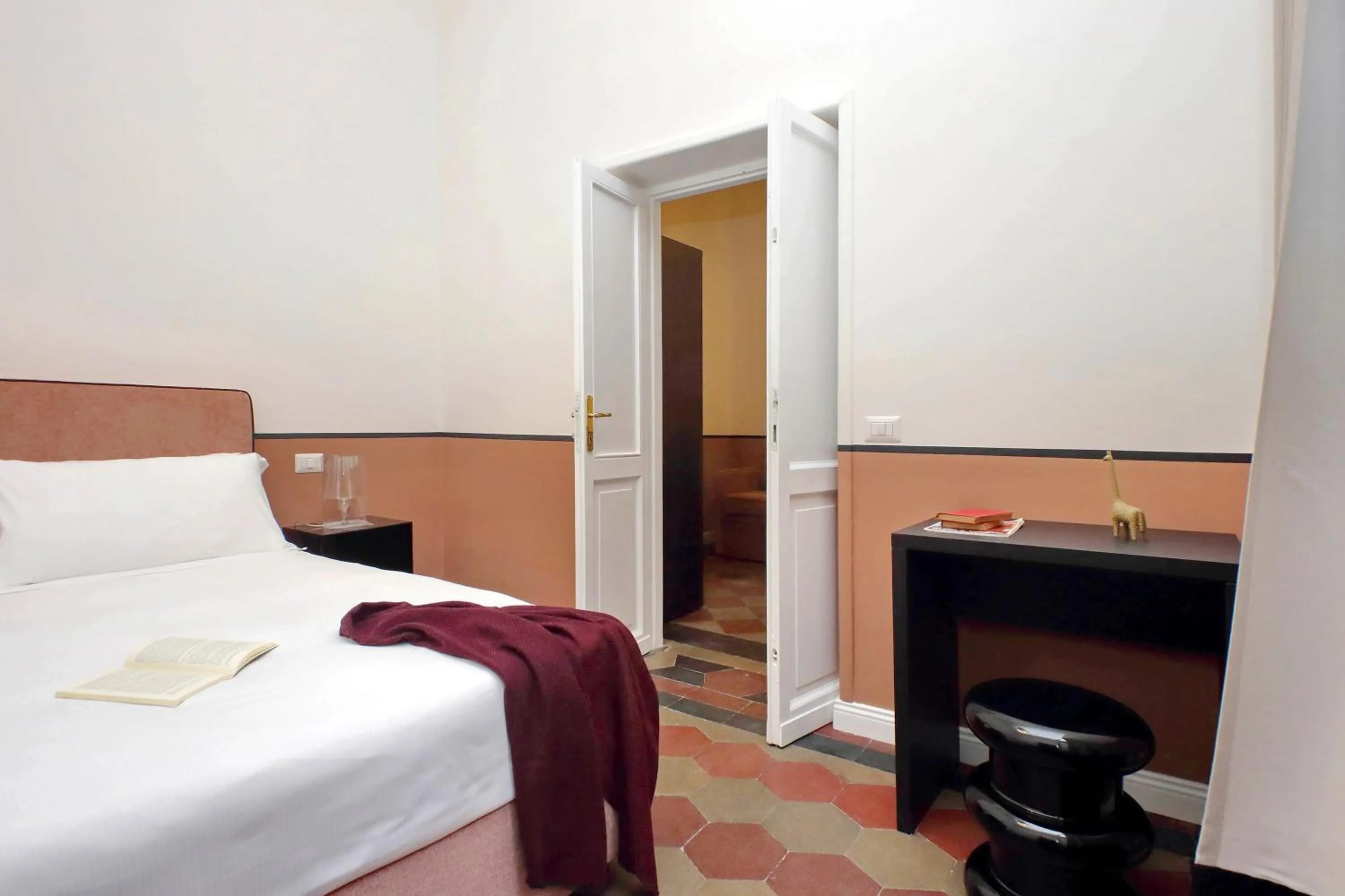 Bed in Monti Apartments - My Extra Home