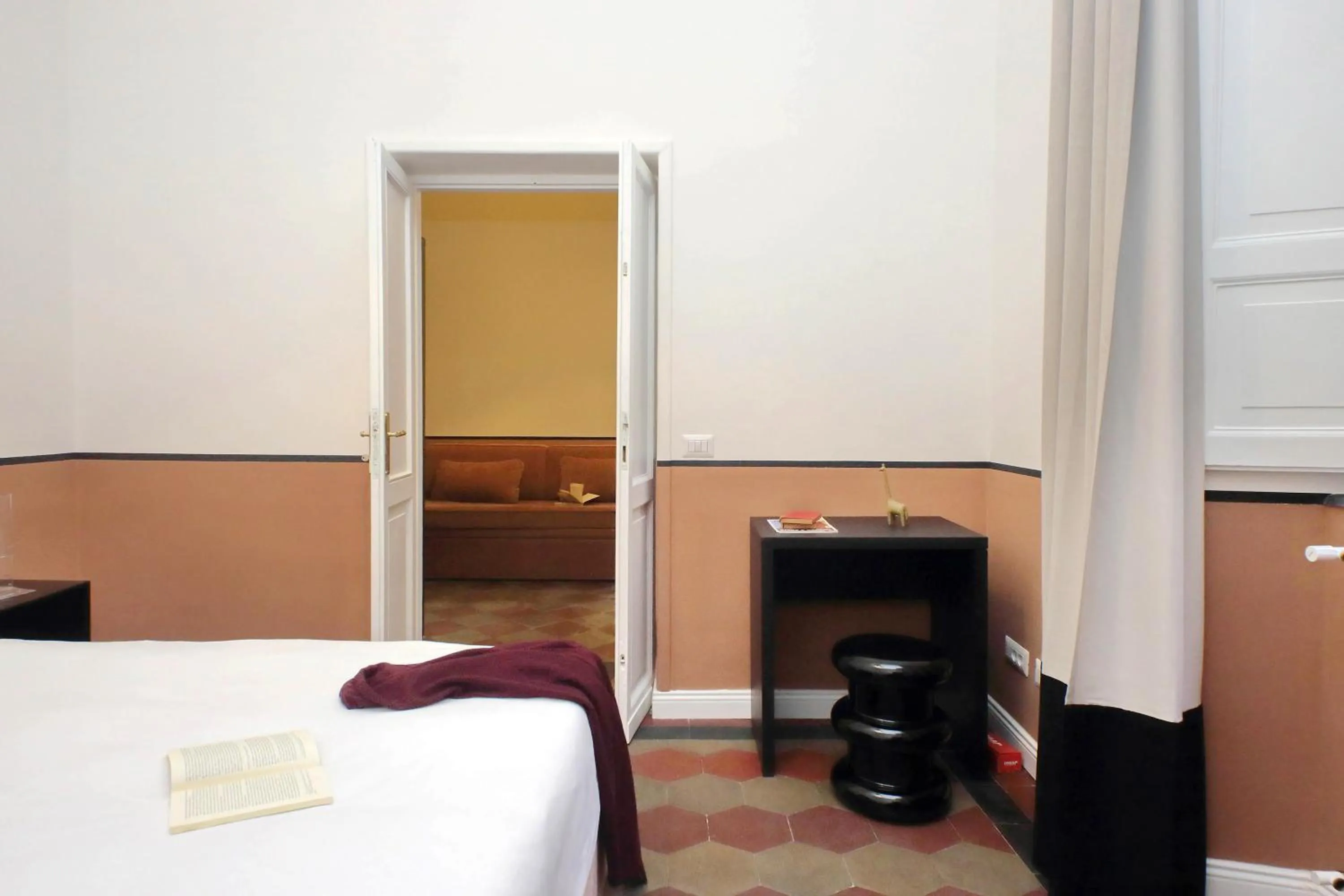 Bed in Monti Apartments - My Extra Home