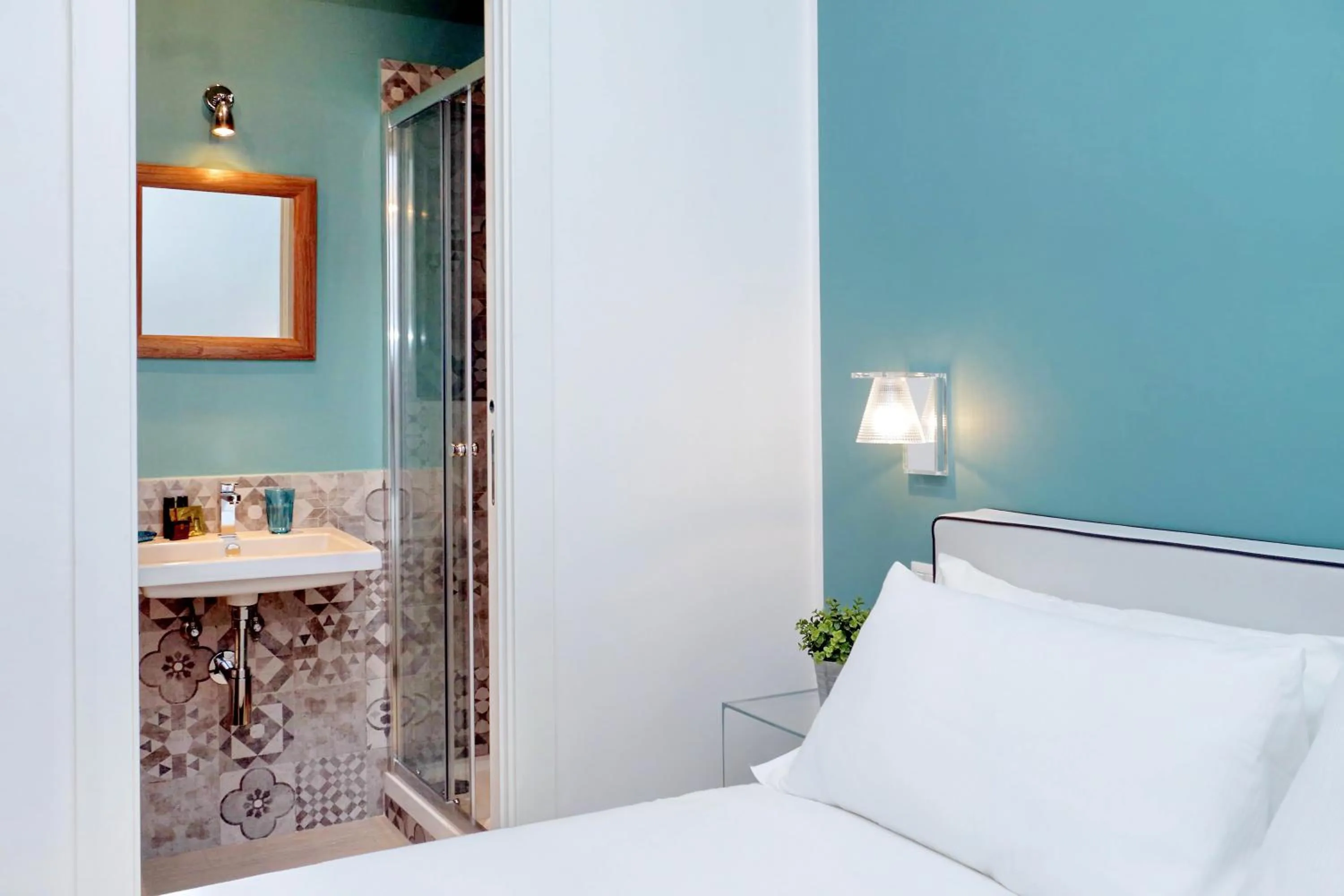 Bed in Monti Apartments - My Extra Home