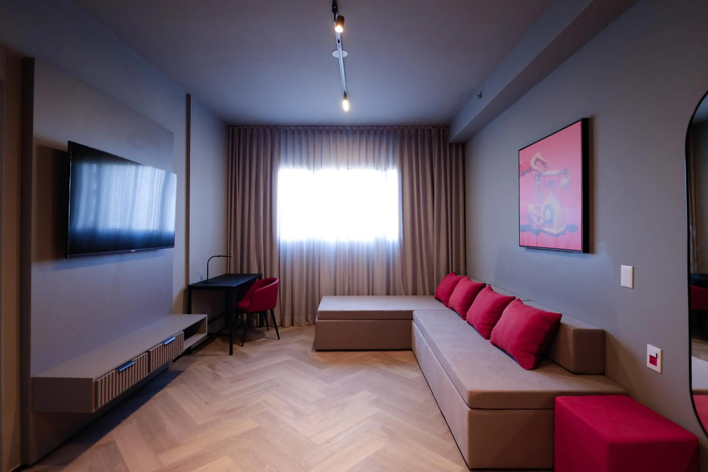 Living room, Bed in Radisson RED Ibirapuera