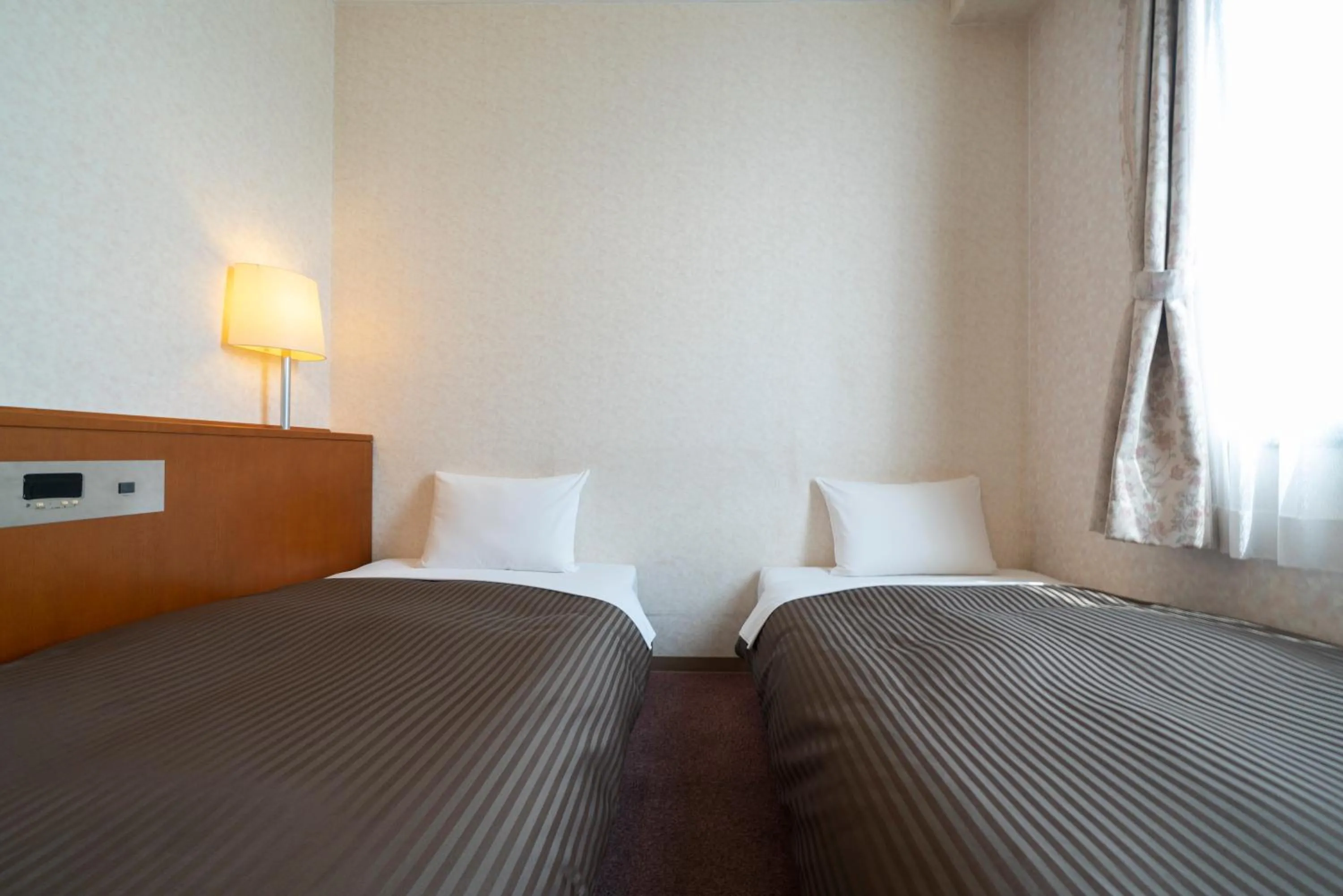 Photo of the whole room, Bed in Royal Hotel Uohachi