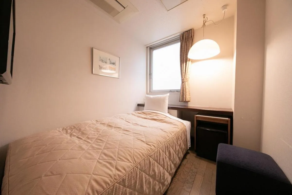 Bed in Morioka City Hotel