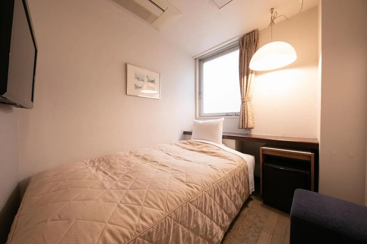 Bed in Morioka City Hotel