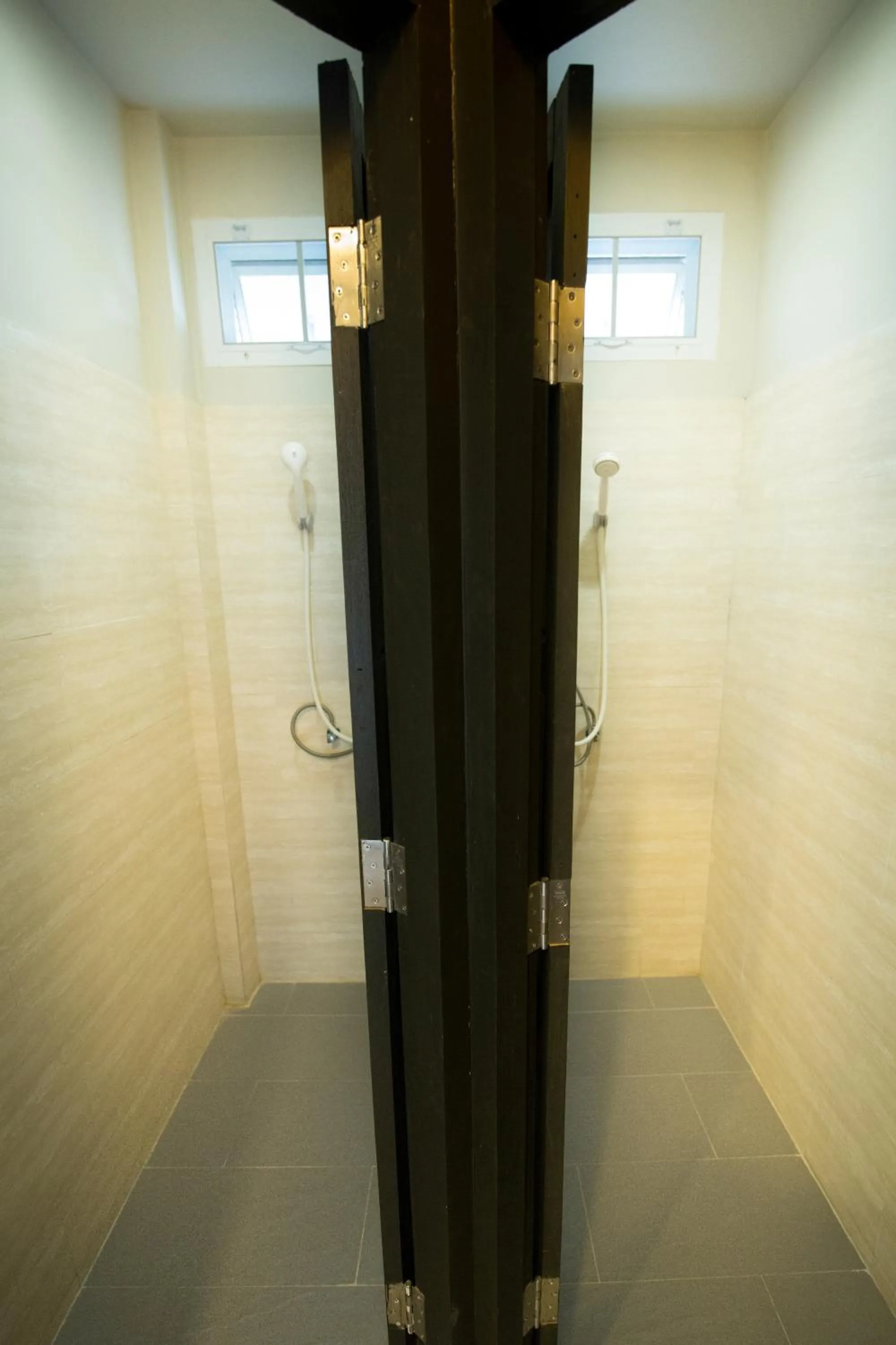 Bathroom in Dorm of Happiness by Tharaburi Resort