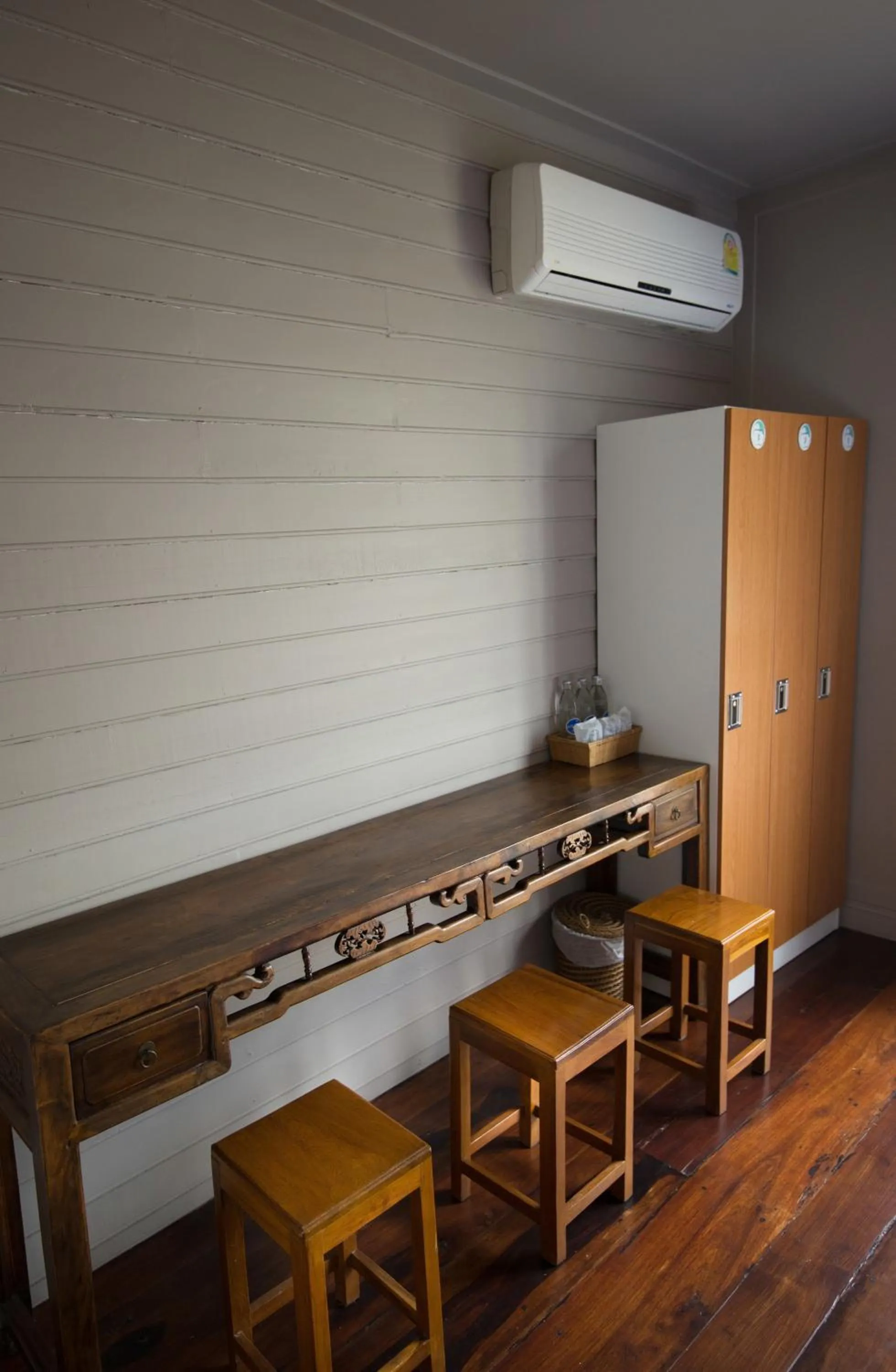 Seating area in Dorm of Happiness by Tharaburi Resort