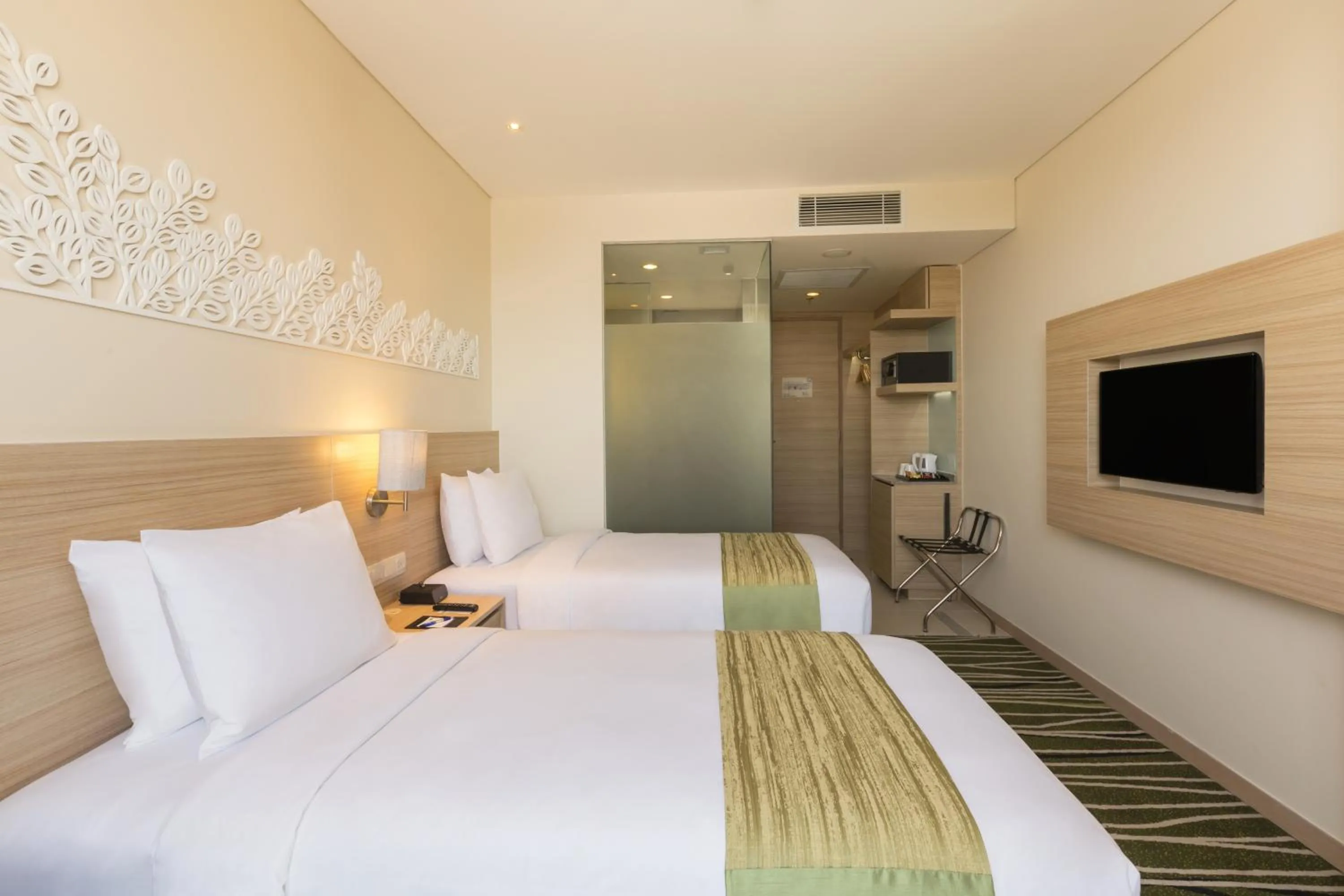 Bed in Holiday Inn Express Semarang Simpang Lima by IHG