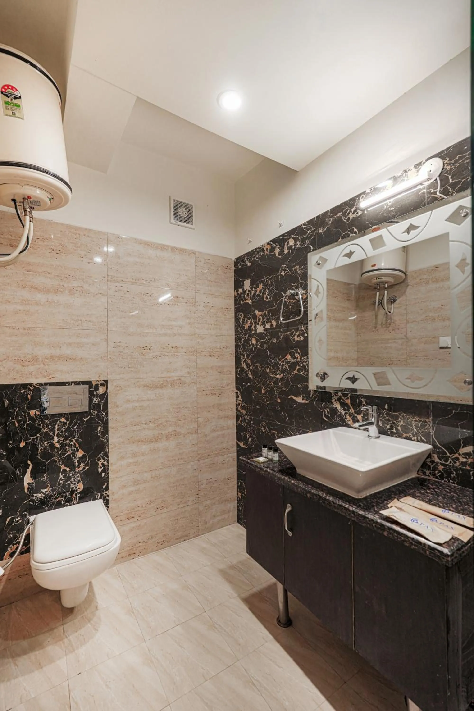 Bathroom in Pax Hotel Spring Solance 200 mtr from Gandhi Chowk Khajjiyar Road