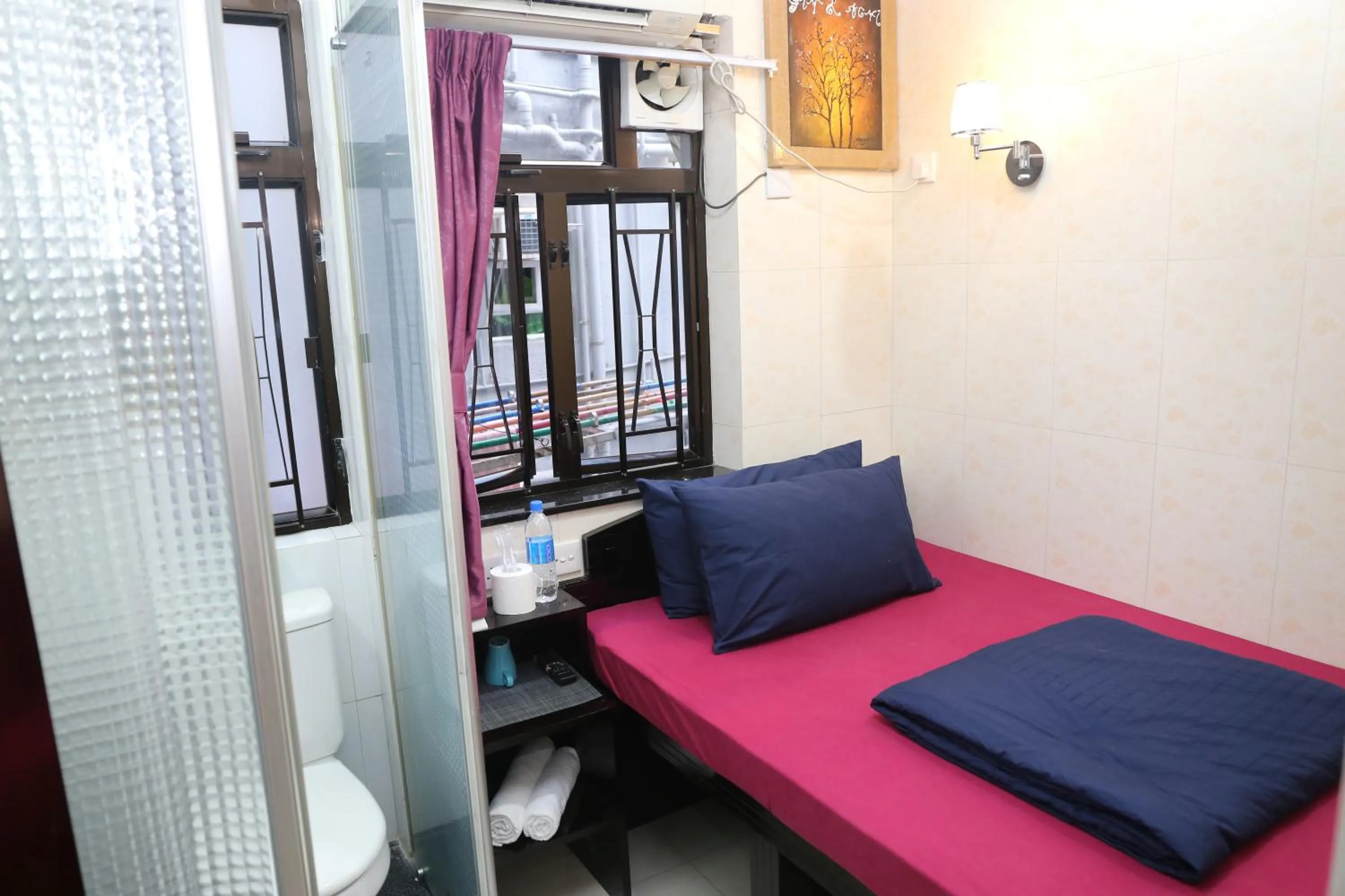 Bedroom, Seating Area in Icon Inn