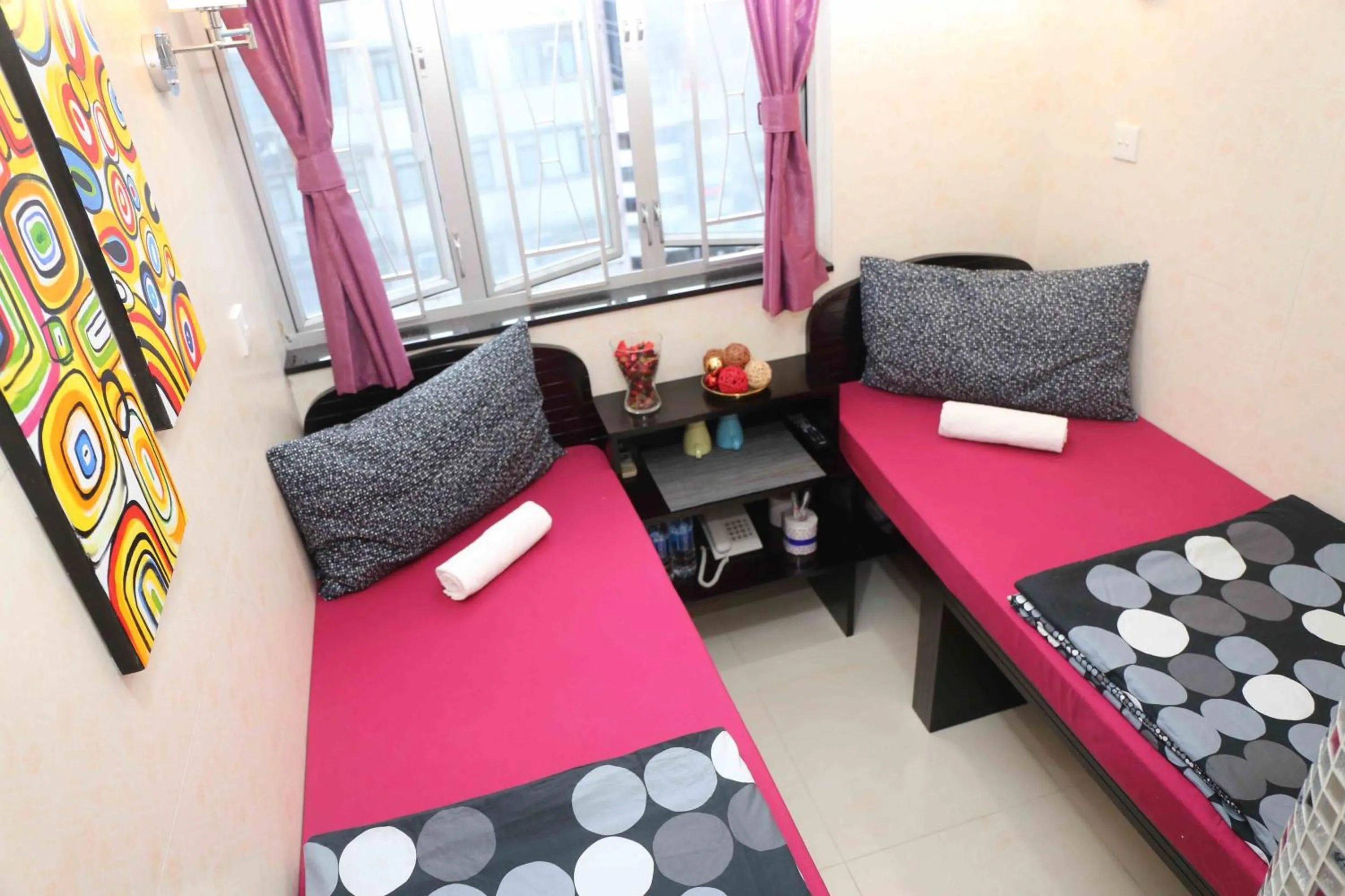 Bedroom, Seating Area in Icon Inn