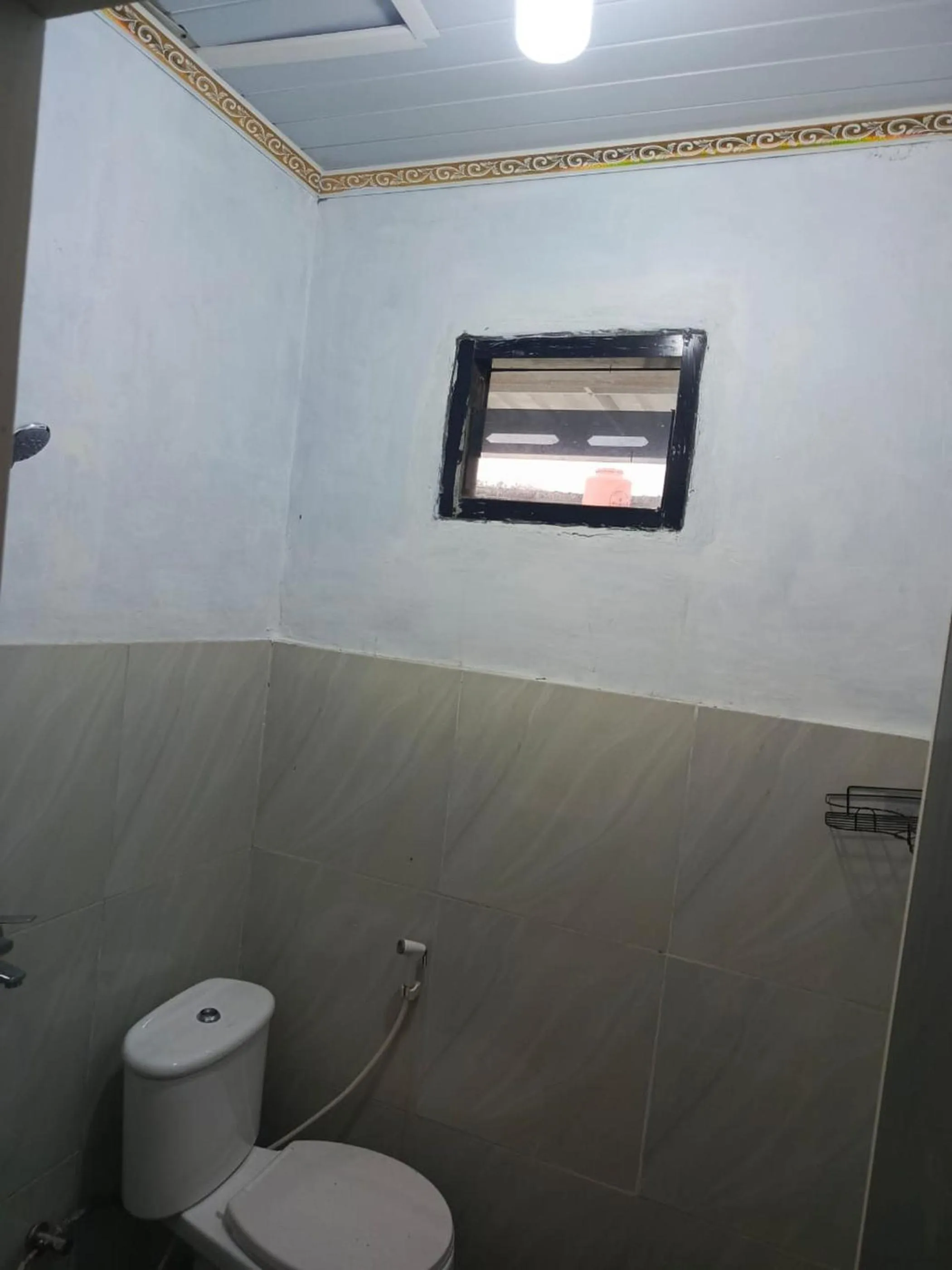 Bathroom in Hotel O Mamanu Sukadamai Residence