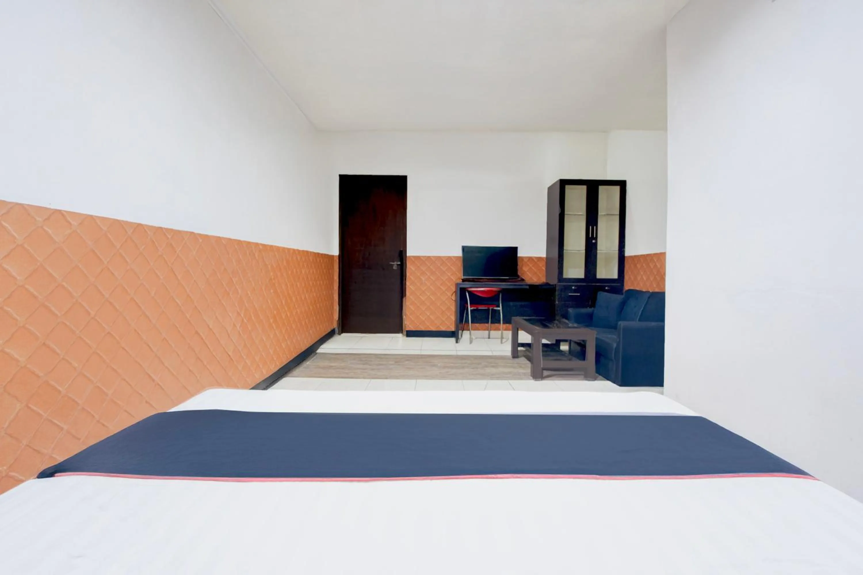 Bed in Hotel O Mega Inn Guest House