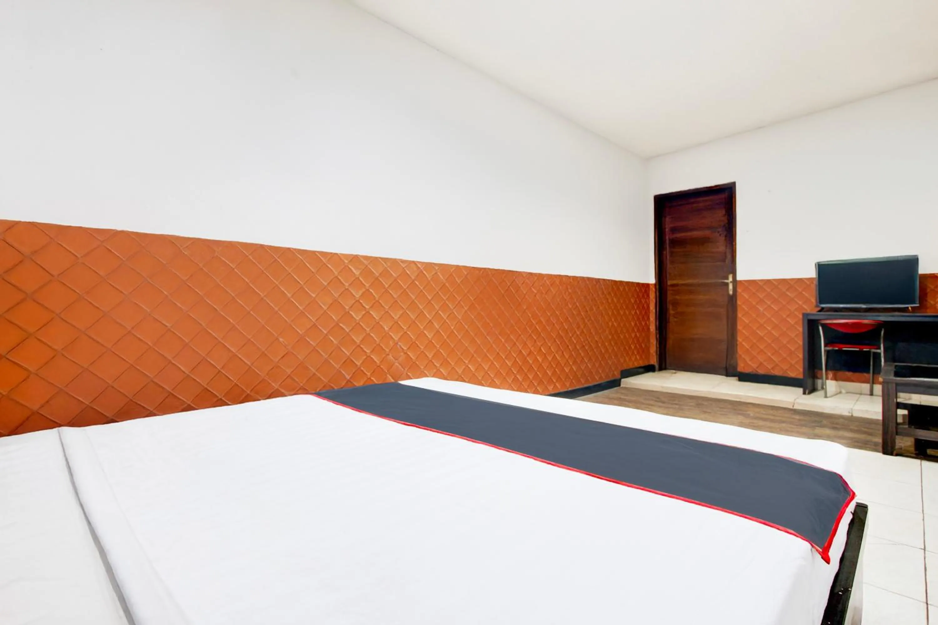 Bed in Hotel O Mega Inn Guest House