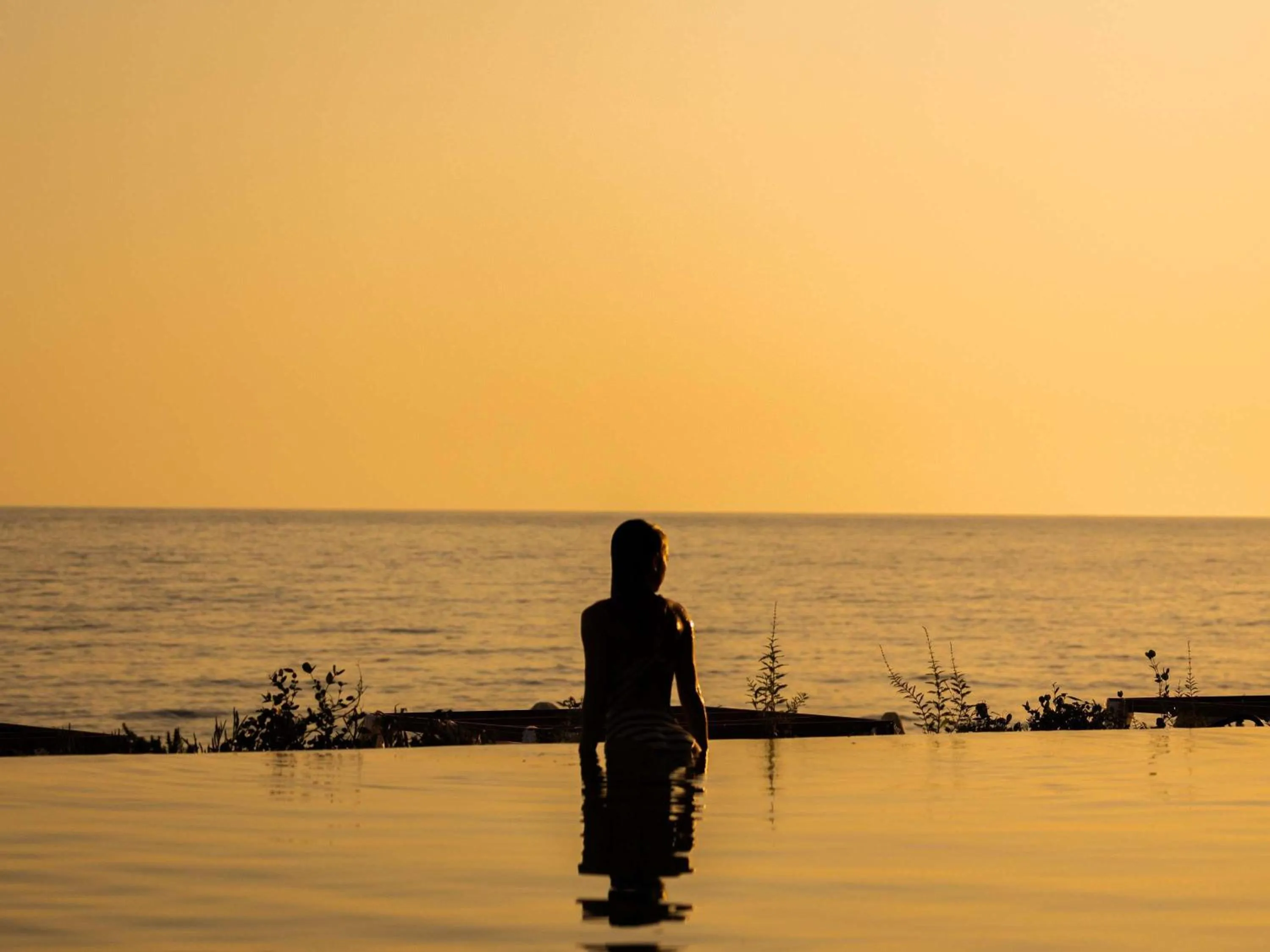 Pool view in Green Coast Hotel MGallery Collection