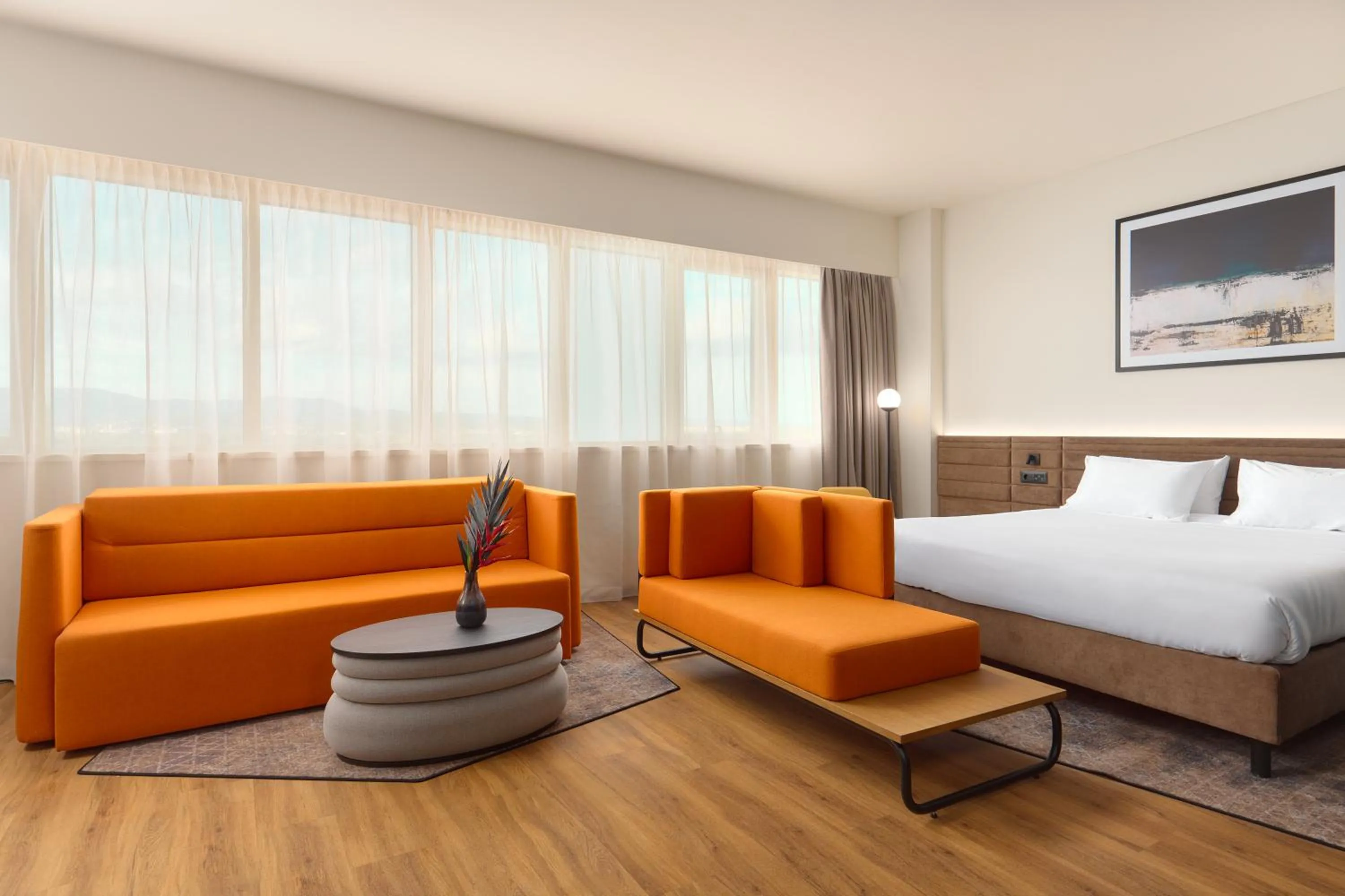 Seating area, Bed in Novotel Zagreb