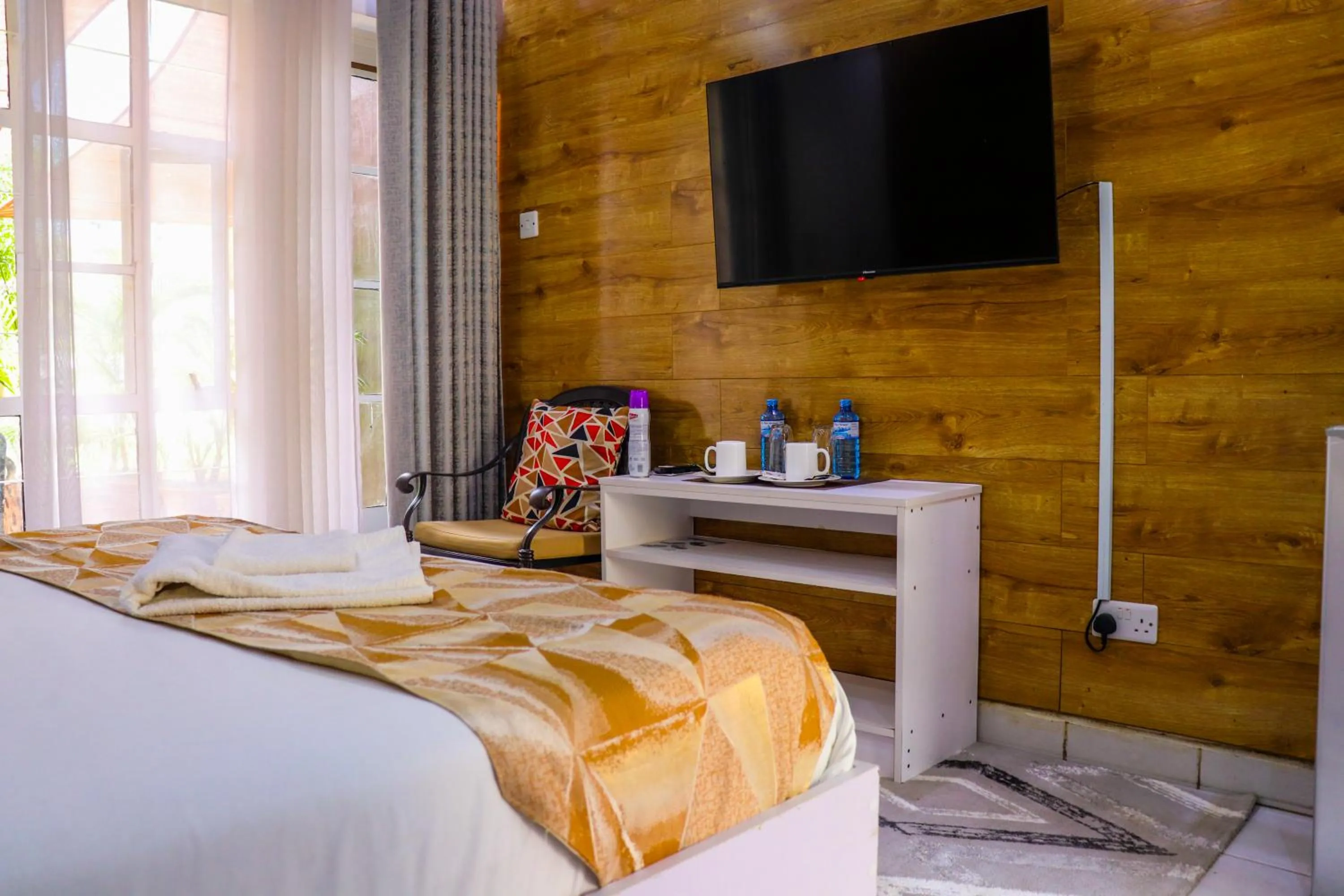 Seating area, Bed in Rio Eco Gardens Hotel