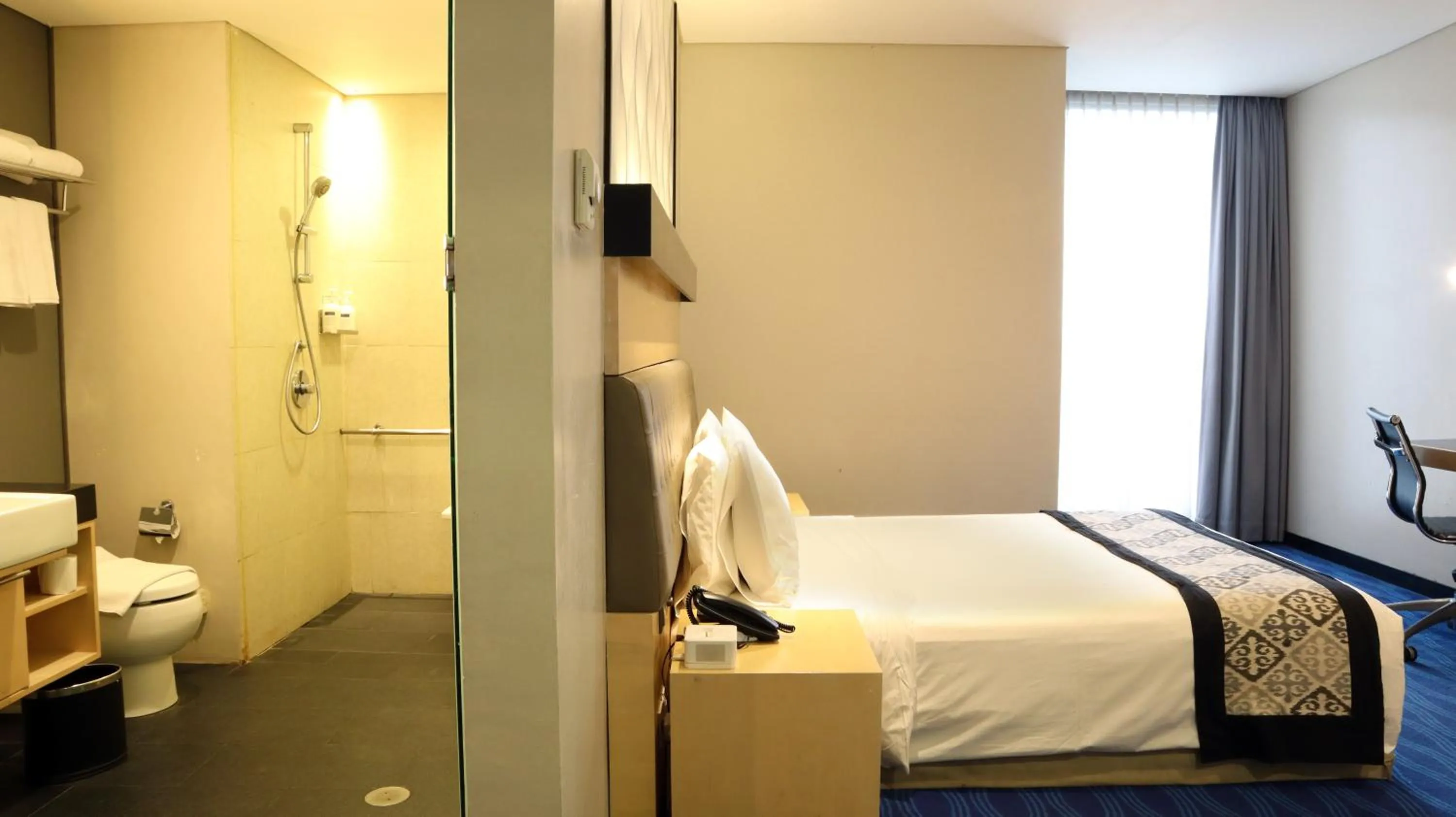 Bed in AI Hotel Jakarta Thamrin