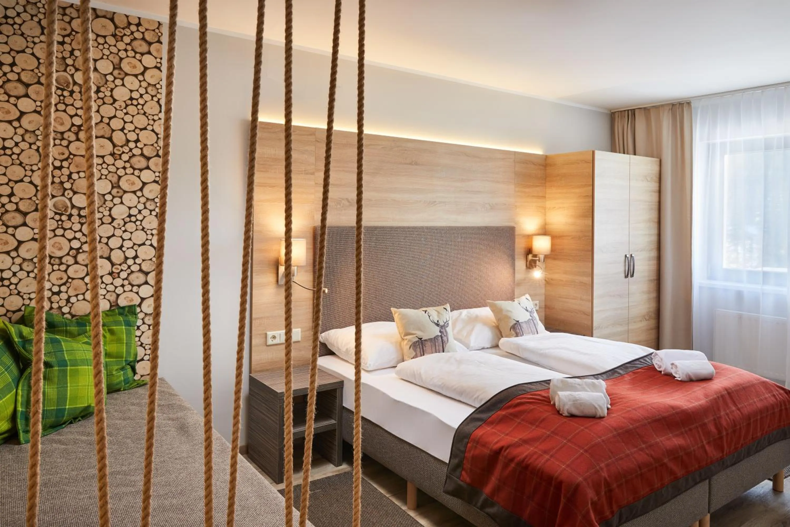 Photo of the whole room, Bed in Das Alpenhaus Katschberg 1640 inkl Lungau Card