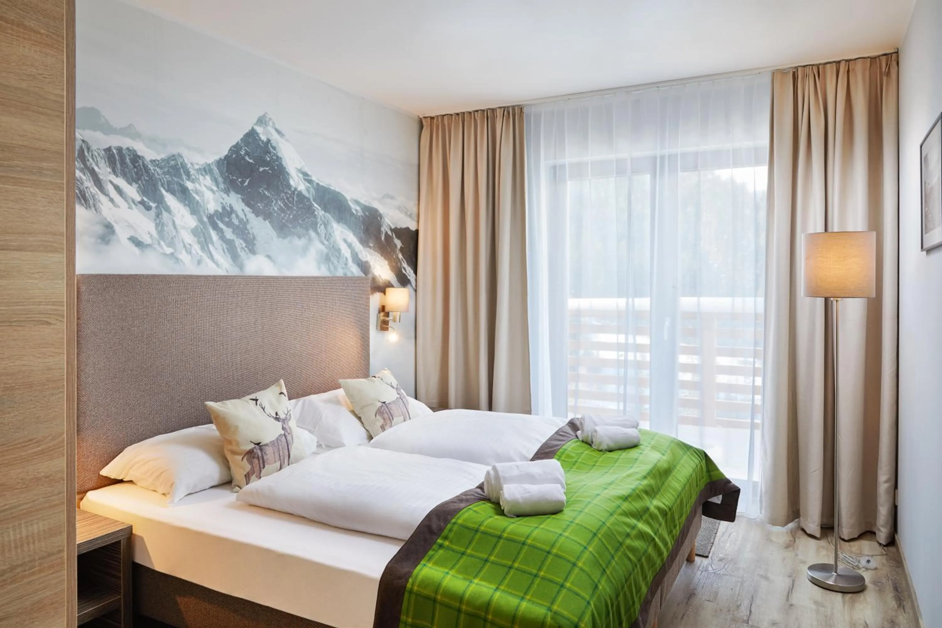 Bed in Das Alpenhaus Katschberg 1640 inkl Lungau Card