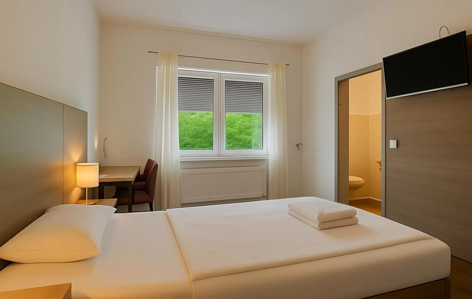Bed in AR Boutique Hotel Heusenstamm