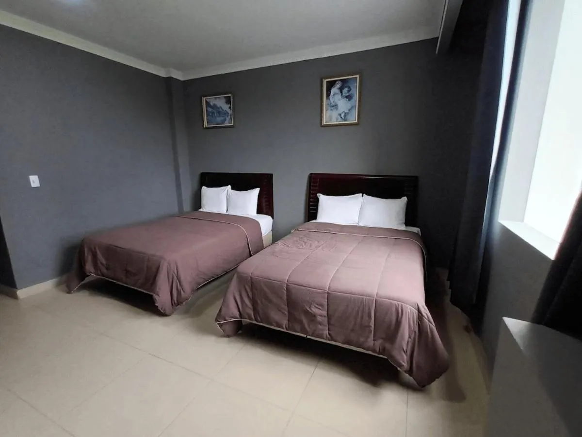 Bed in New Washington Hotel