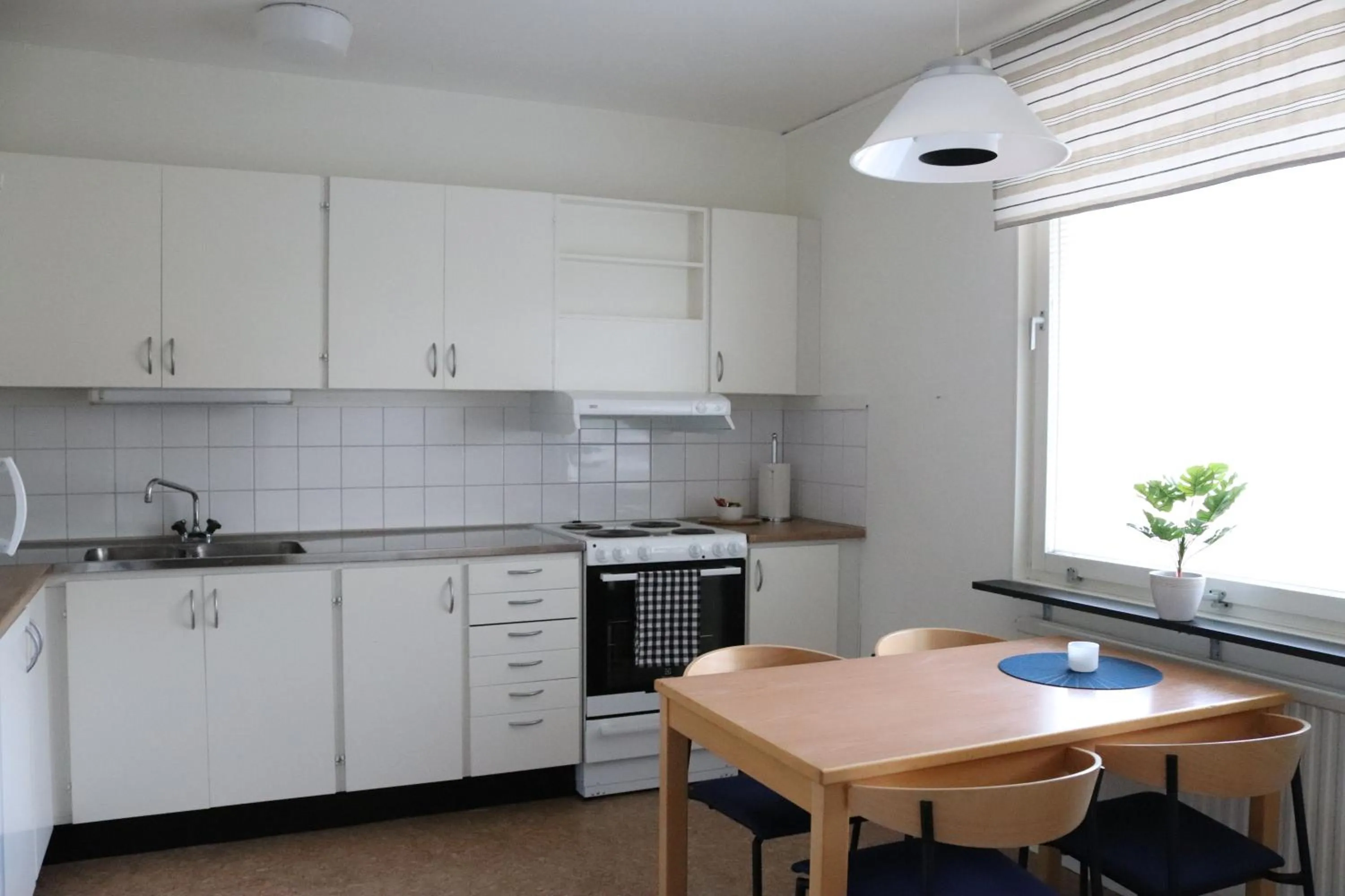 Kitchen or kitchenette in RS Lägenhetshotell Skövde