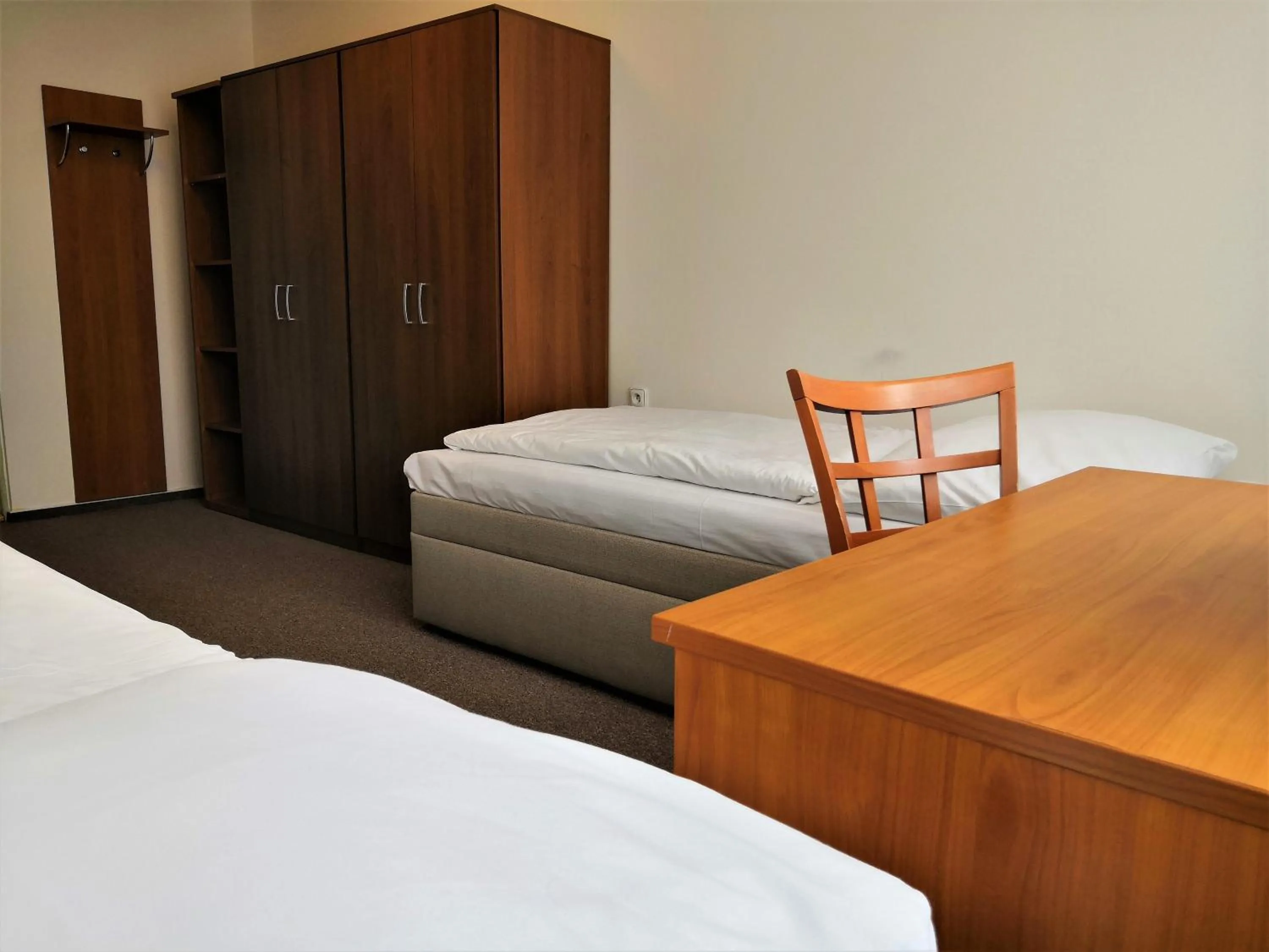 Bed in Hotel Marianeum