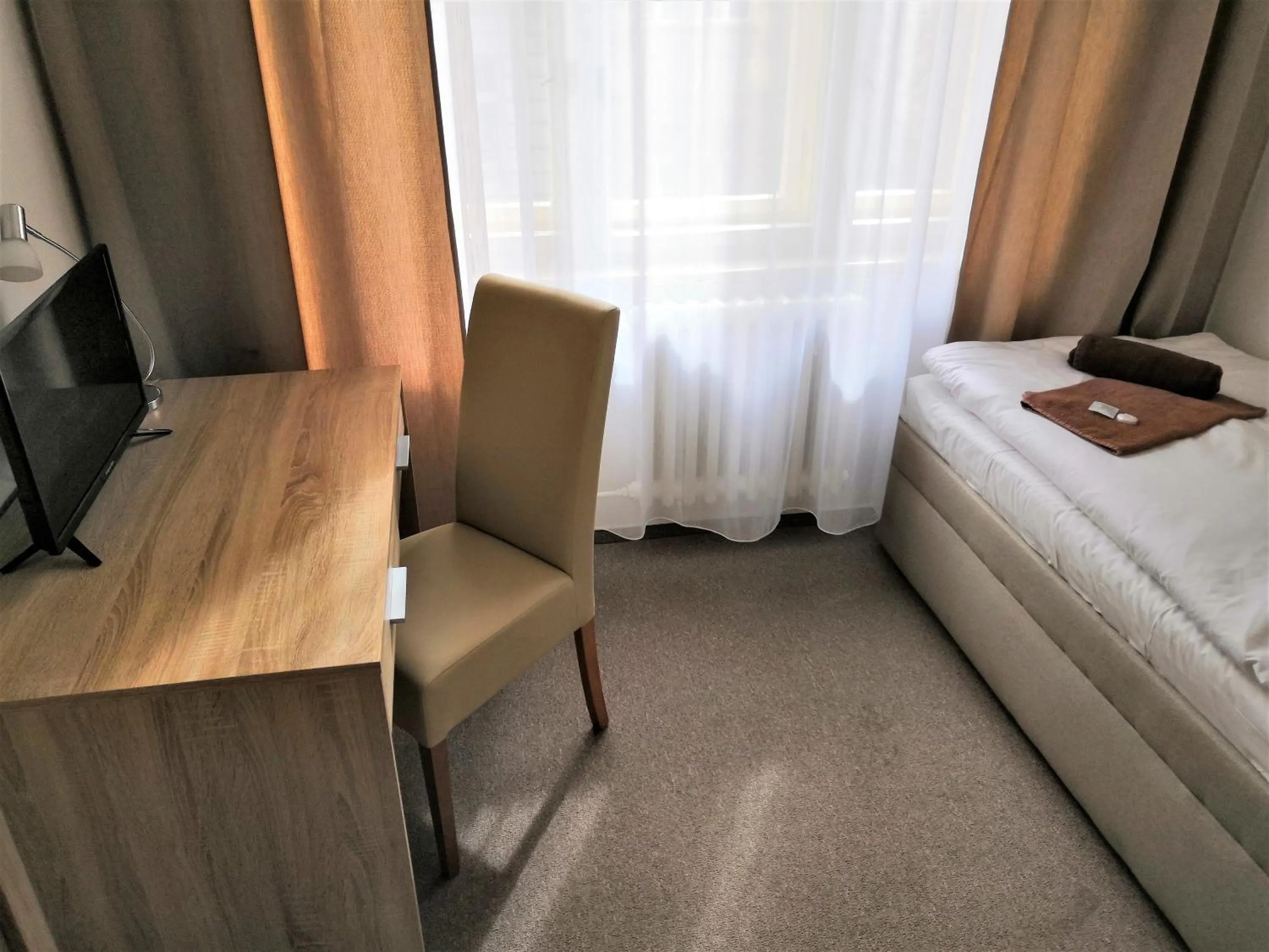 Bed in Hotel Marianeum