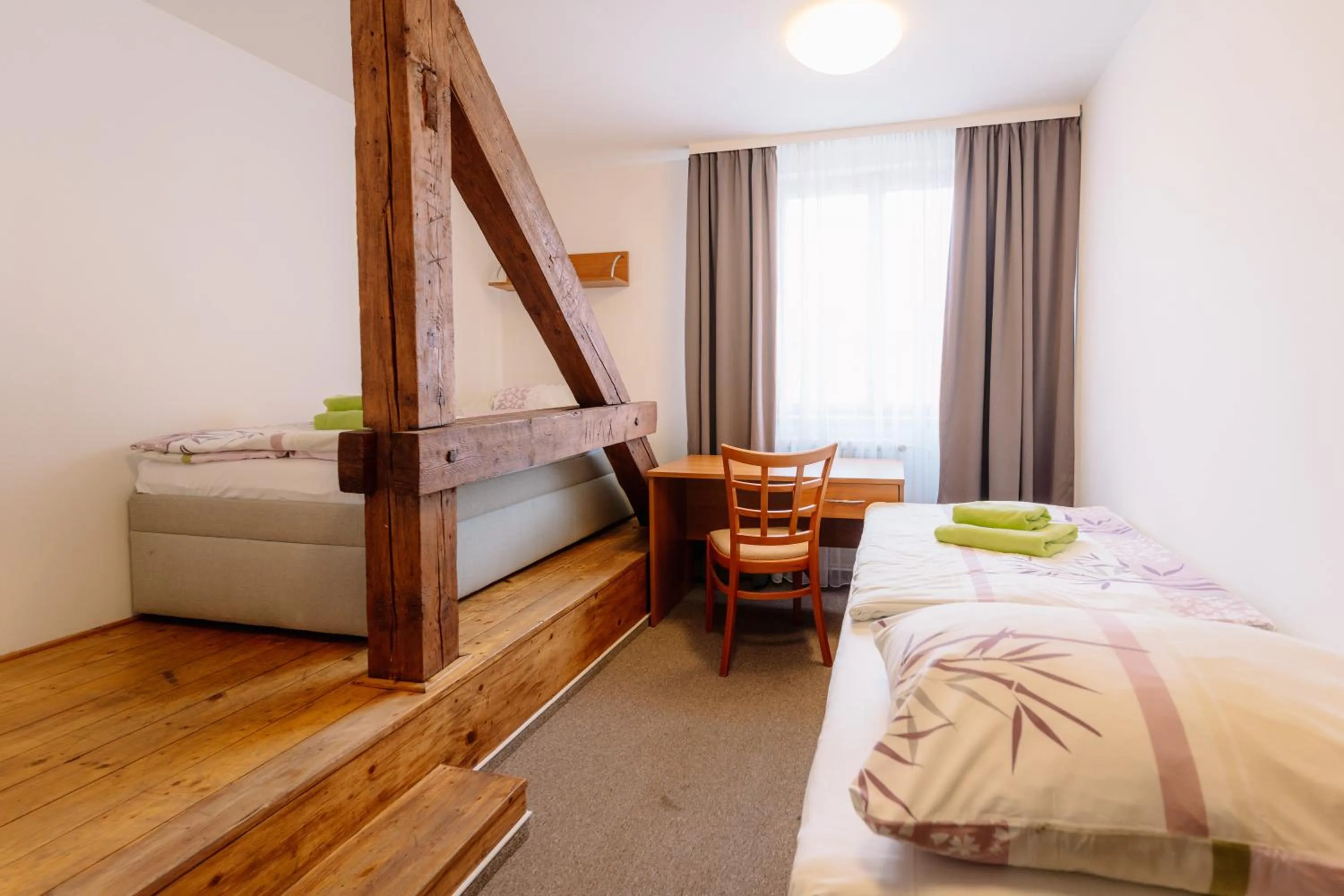 Bed in Hotel Marianeum