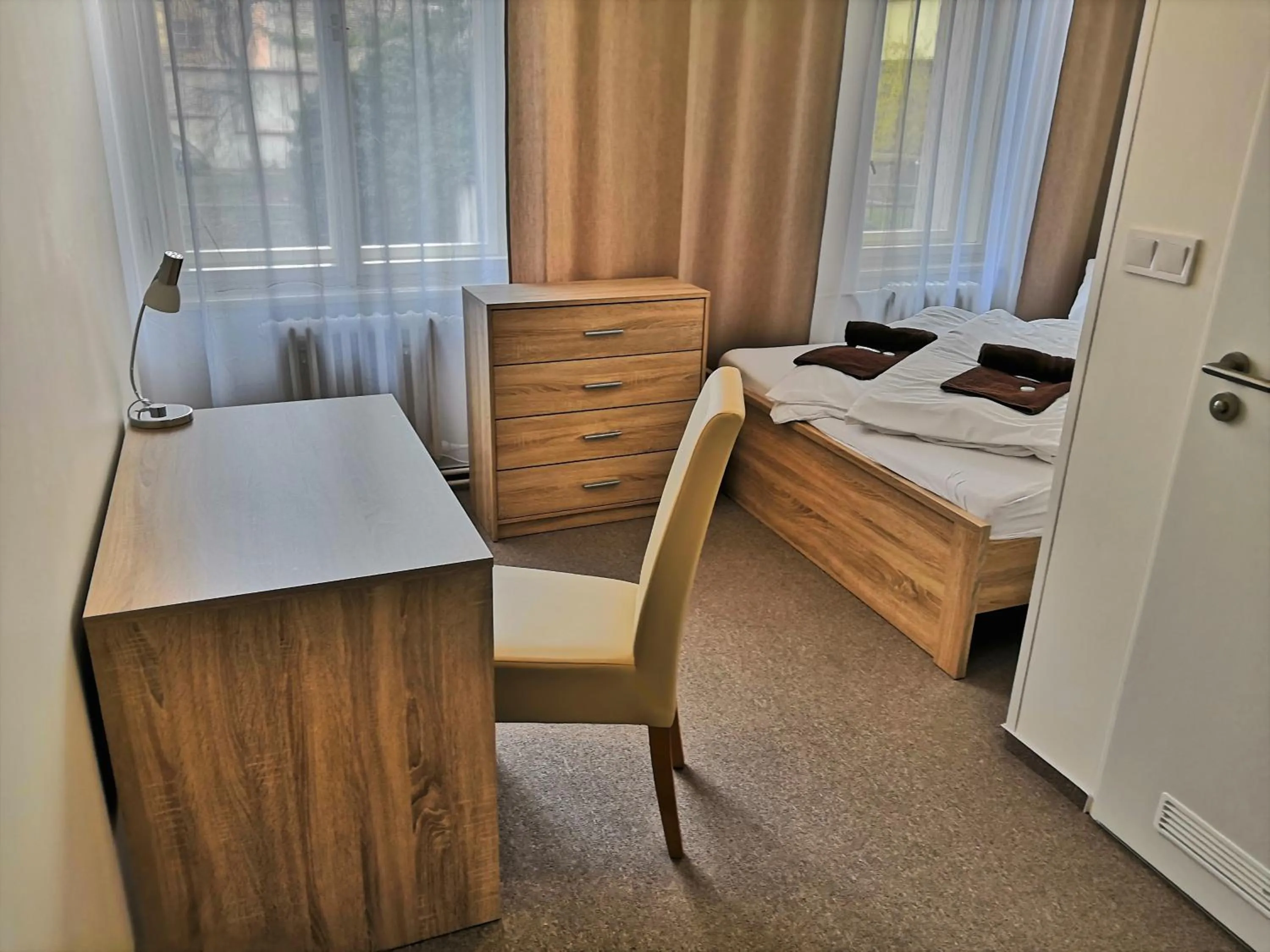 Bed in Hotel Marianeum