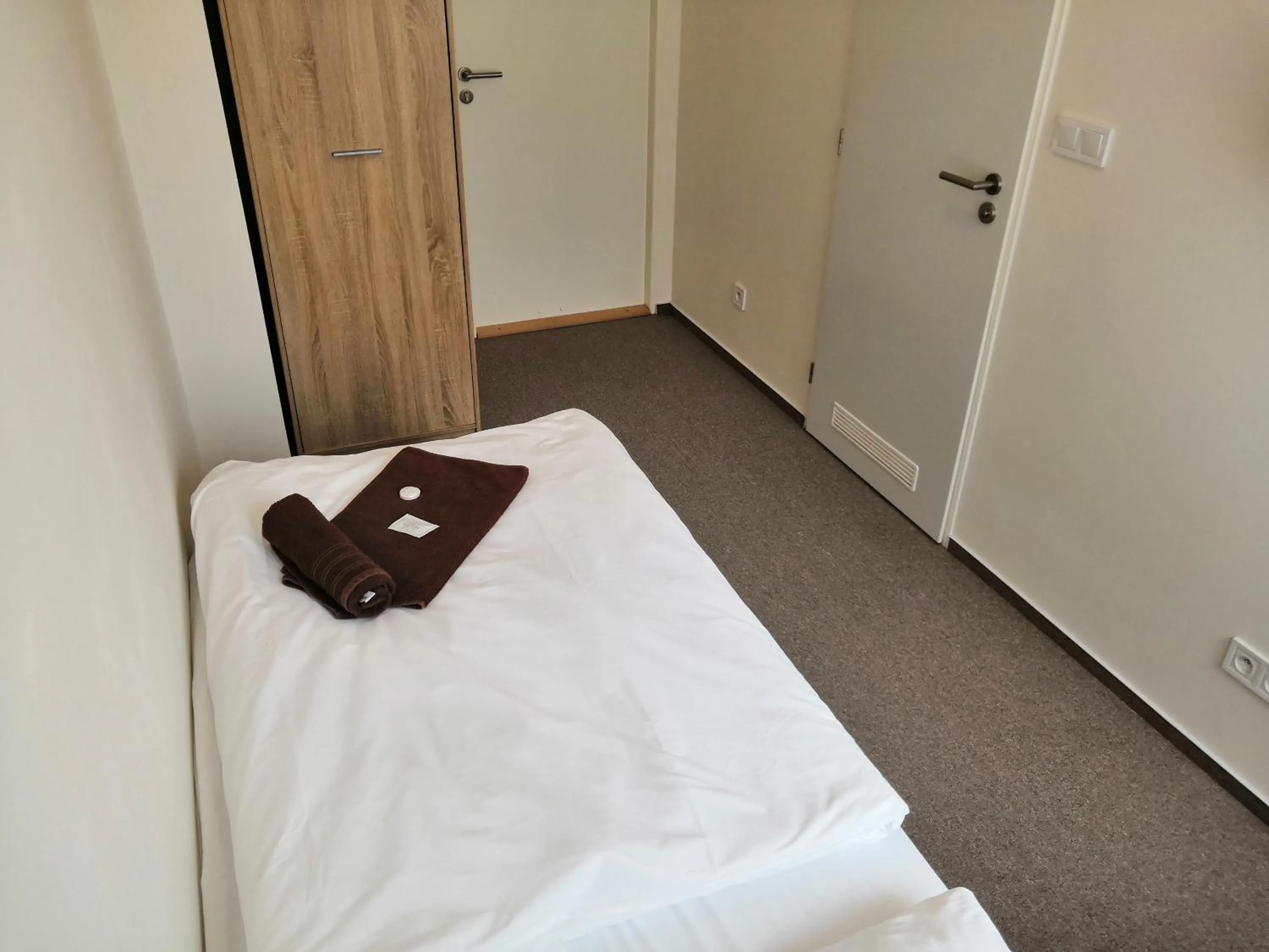 Bed in Hotel Marianeum