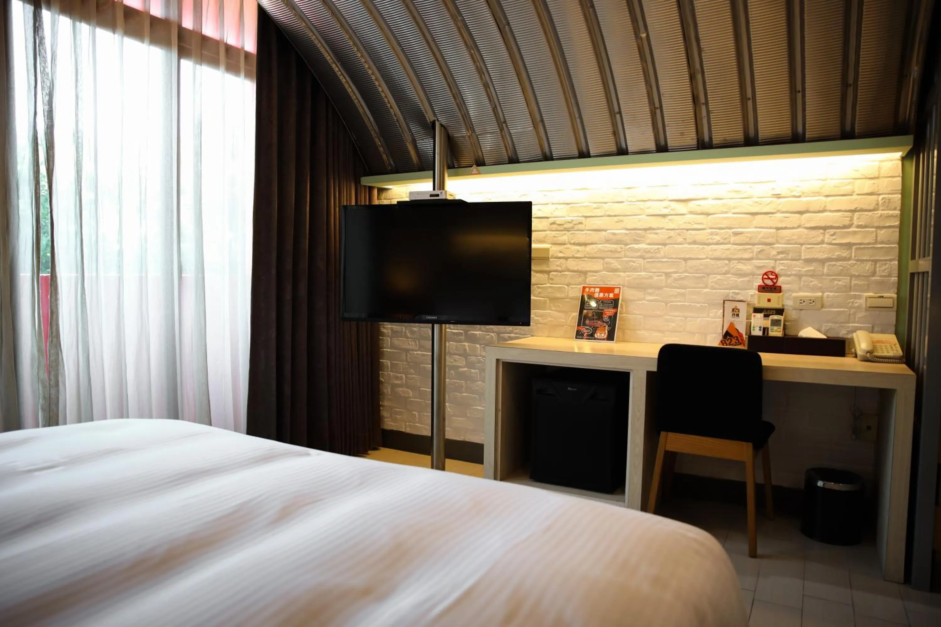 Bed in 823 Tourist Hotel