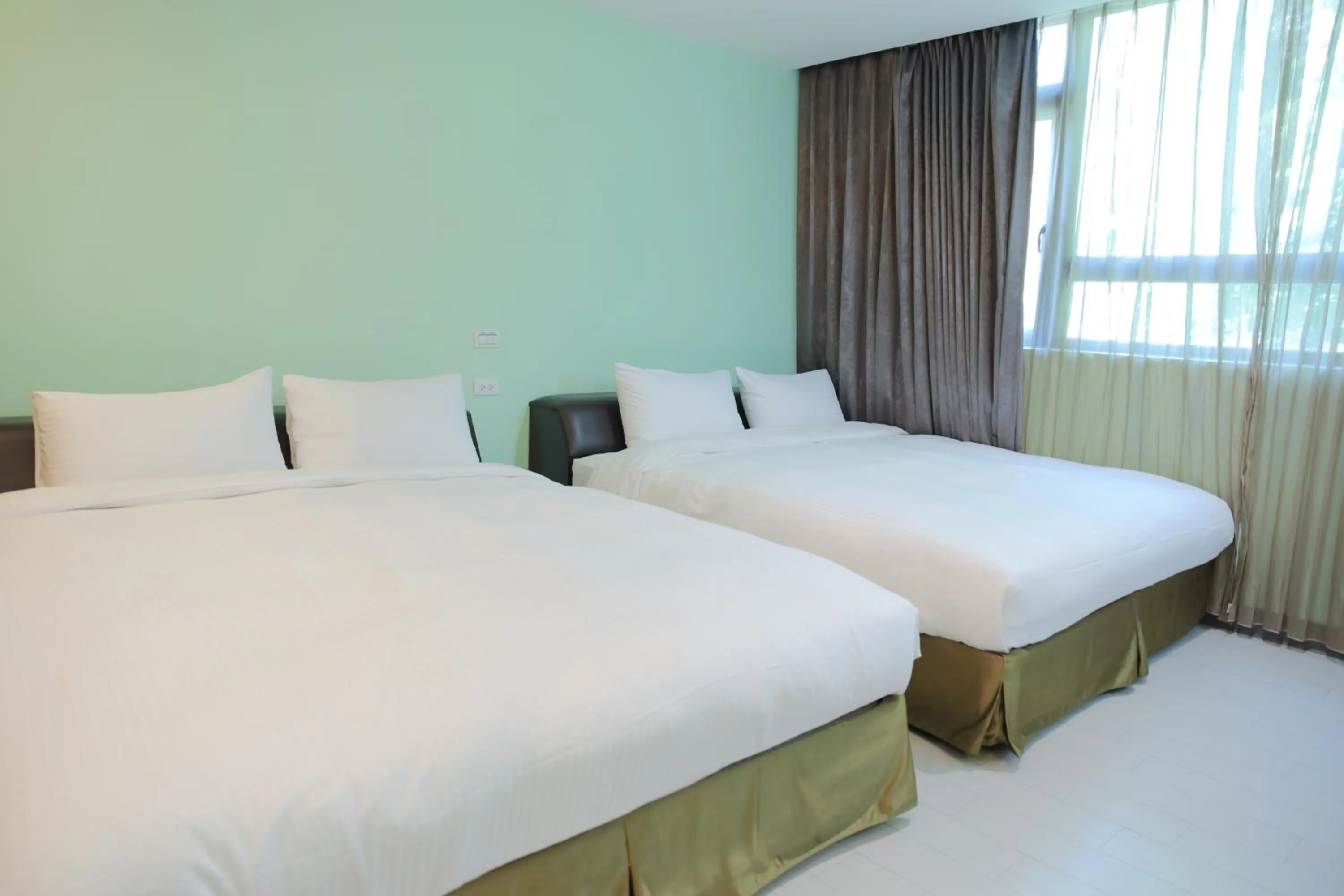 Bed in 823 Tourist Hotel