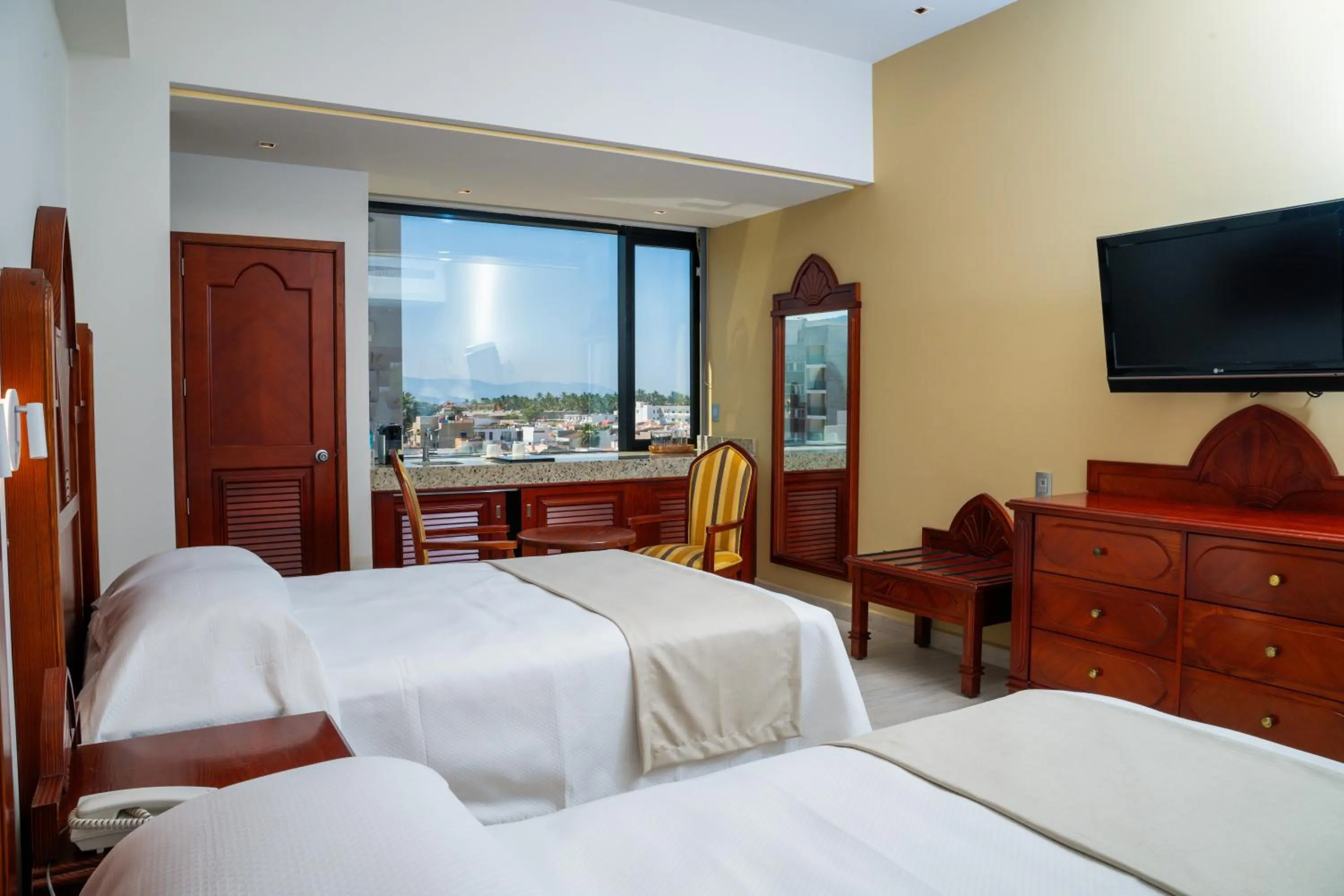 Photo of the whole room, Bed in Vallarta Live Hotel