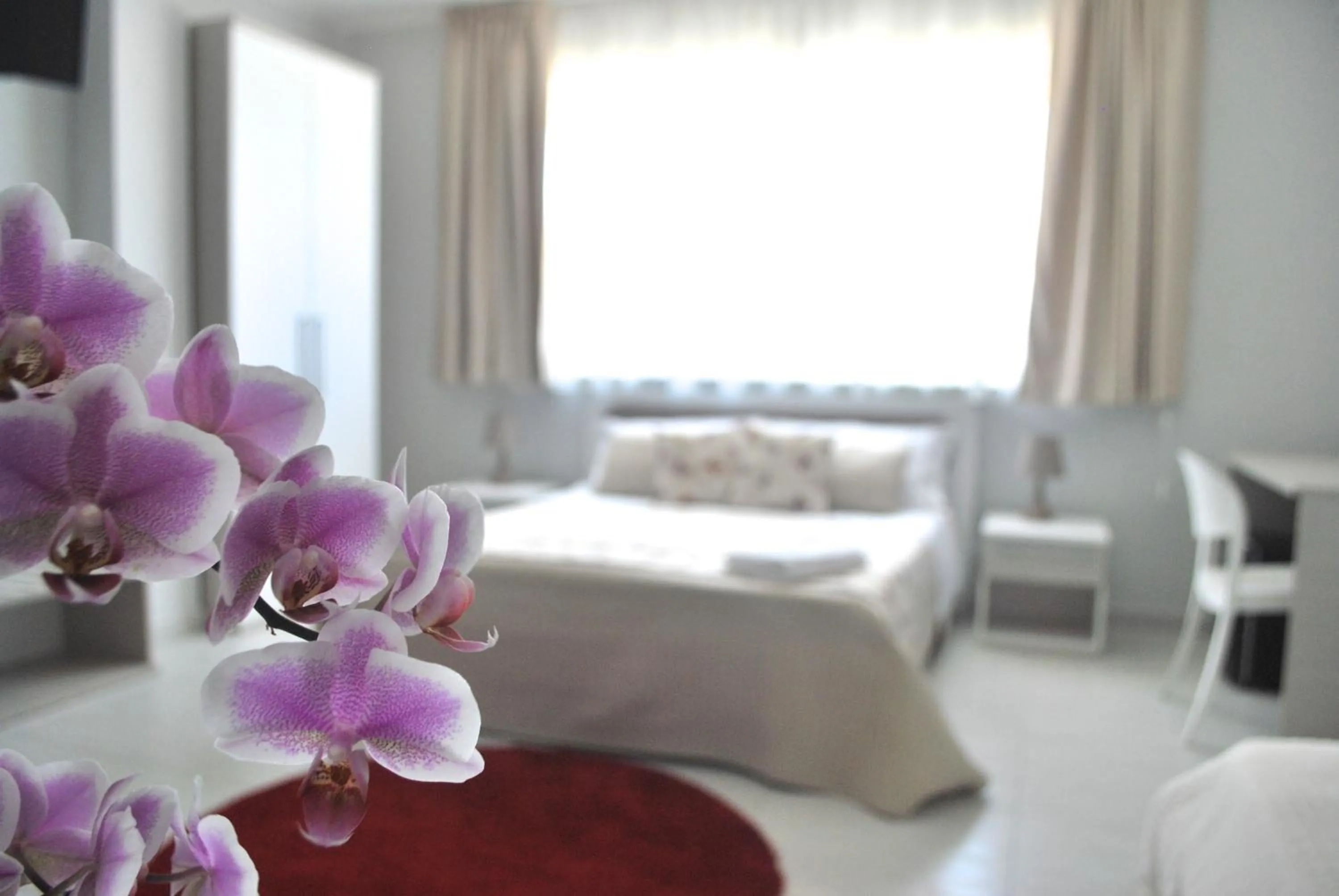 Bed in Pietra Bianca Rooms