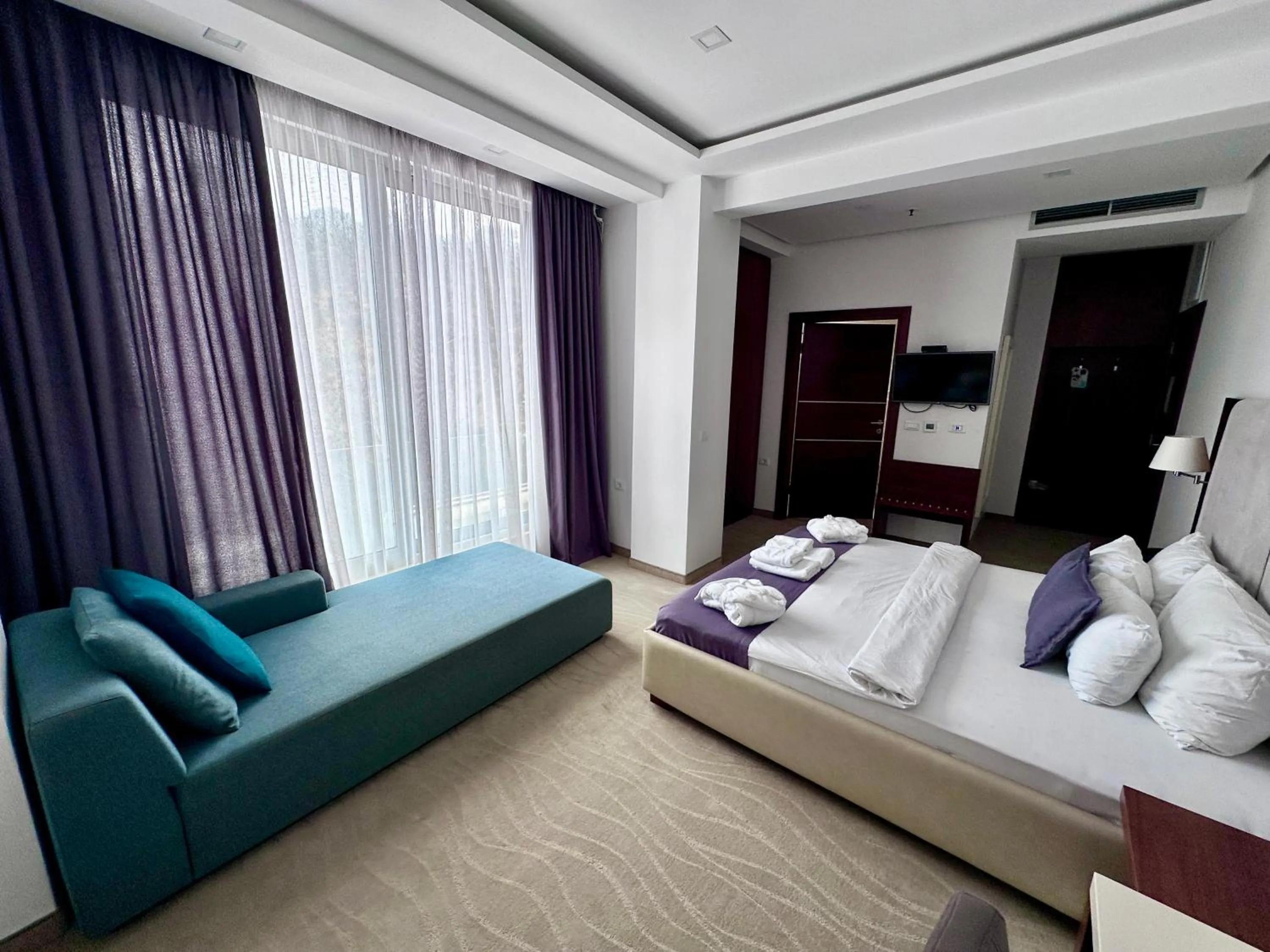 Communal lounge/ TV room in Hotel Porto Sole