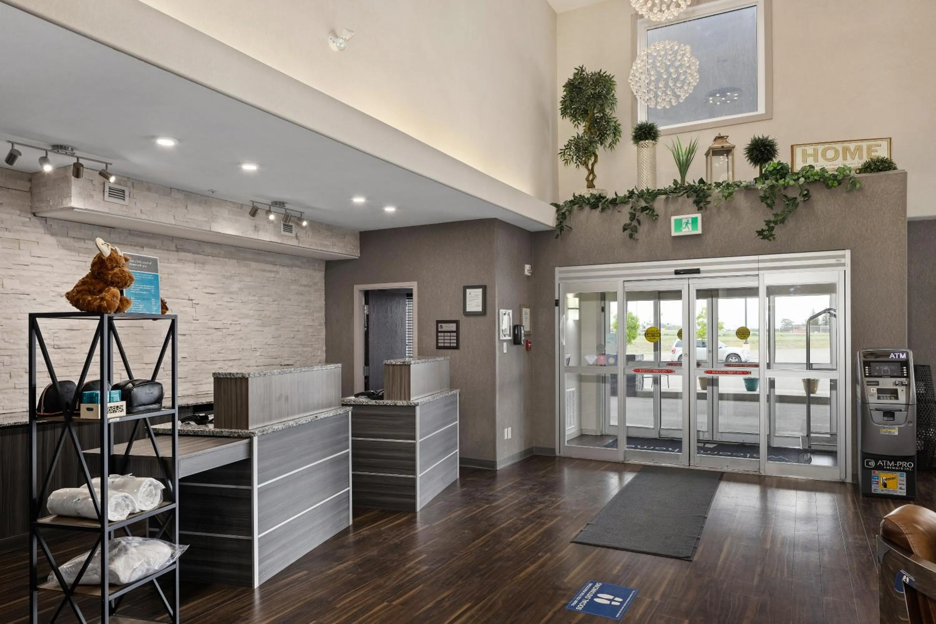 Lobby or reception in Home Inn & Suites Saskatoon South