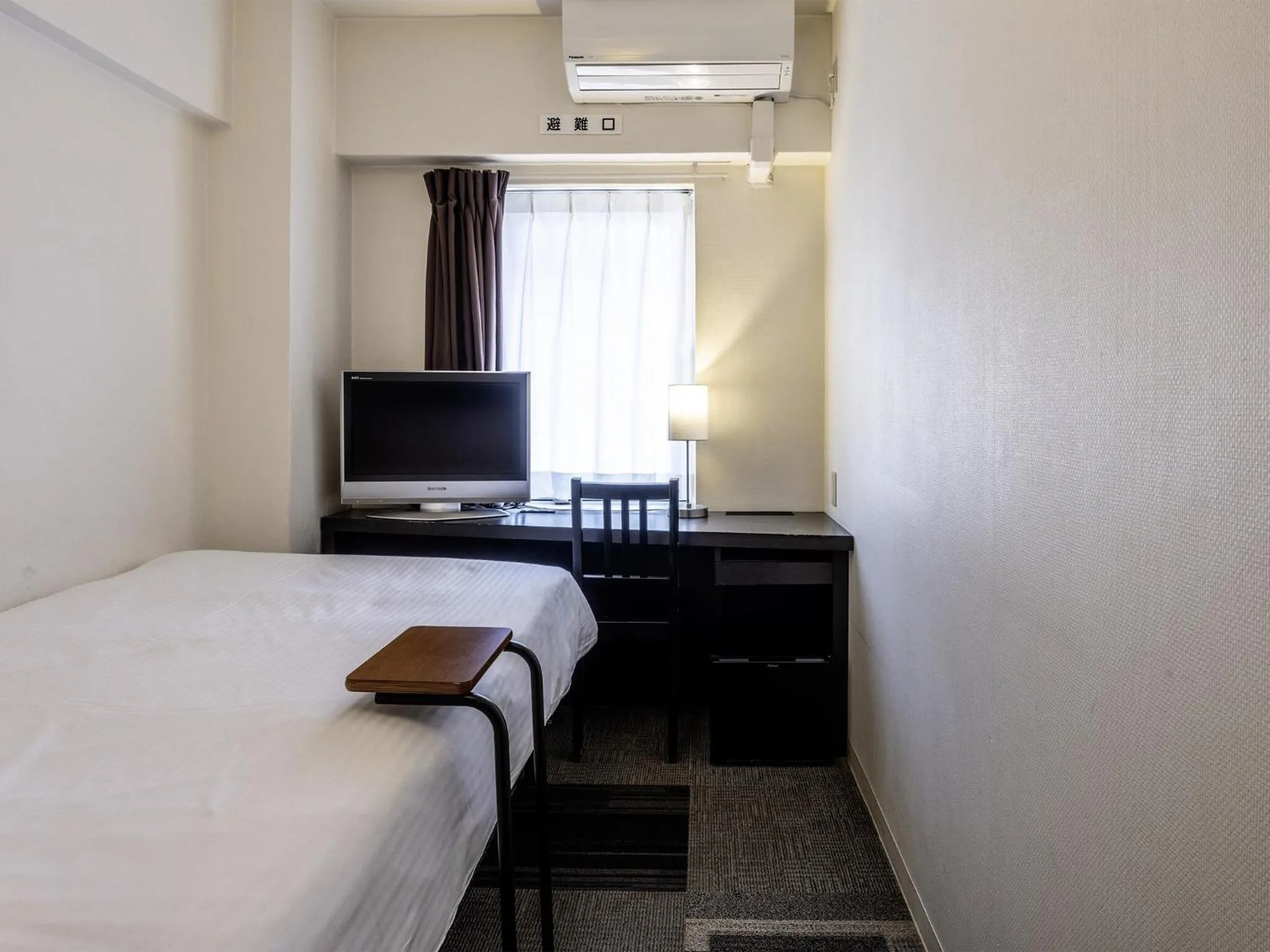 Photo of the whole room, Bed in KOKO HOTEL Yokohama Tsurumi