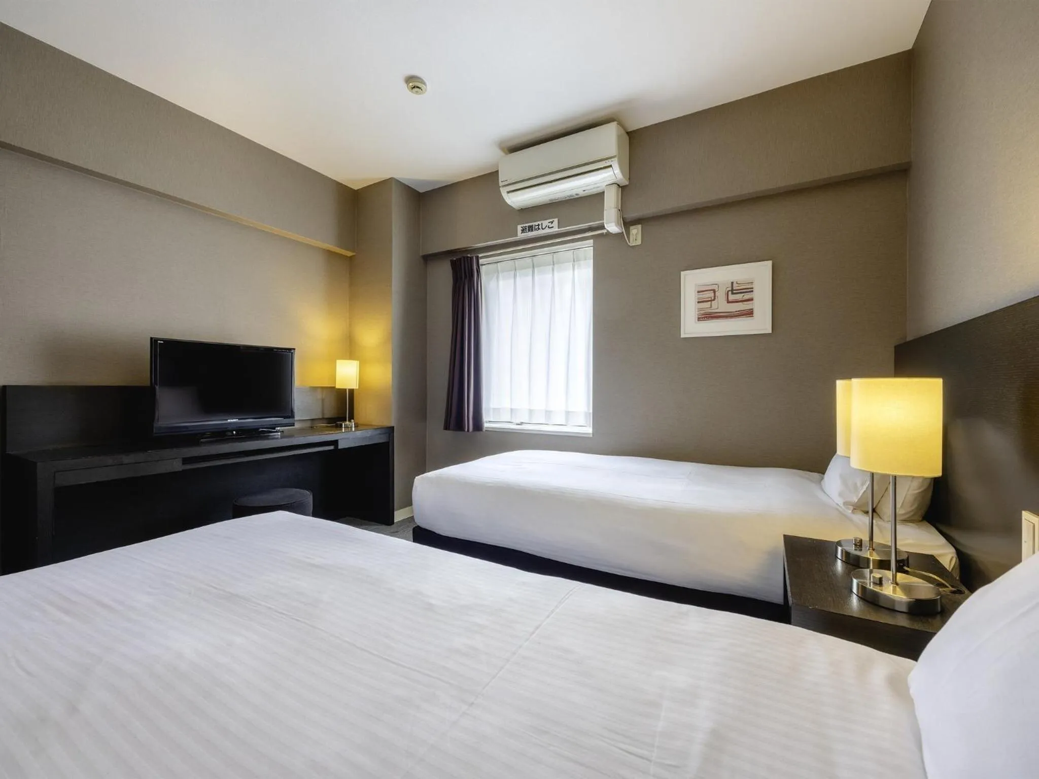 Photo of the whole room, Bed in KOKO HOTEL Yokohama Tsurumi