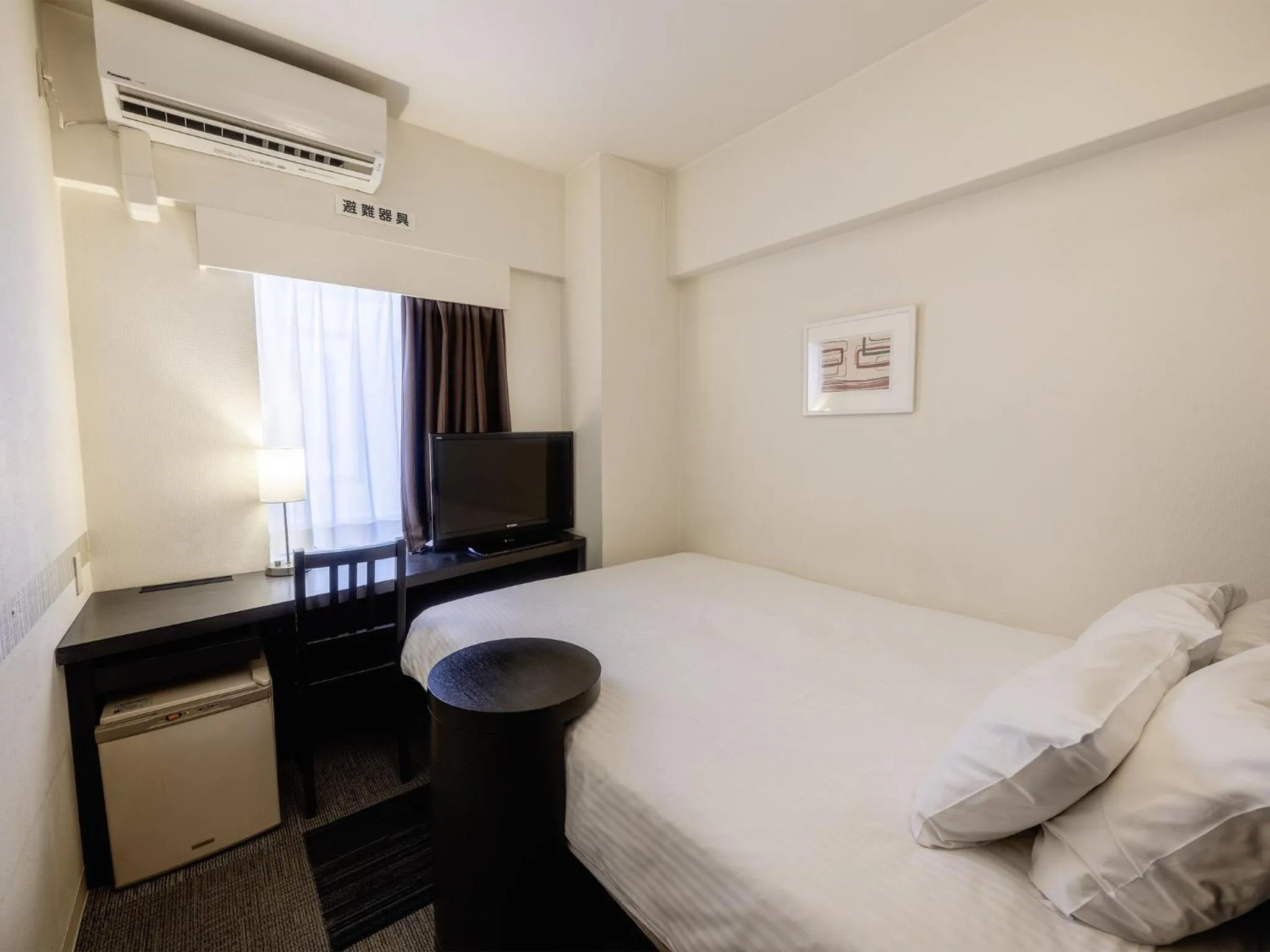 Photo of the whole room, Bed in KOKO HOTEL Yokohama Tsurumi
