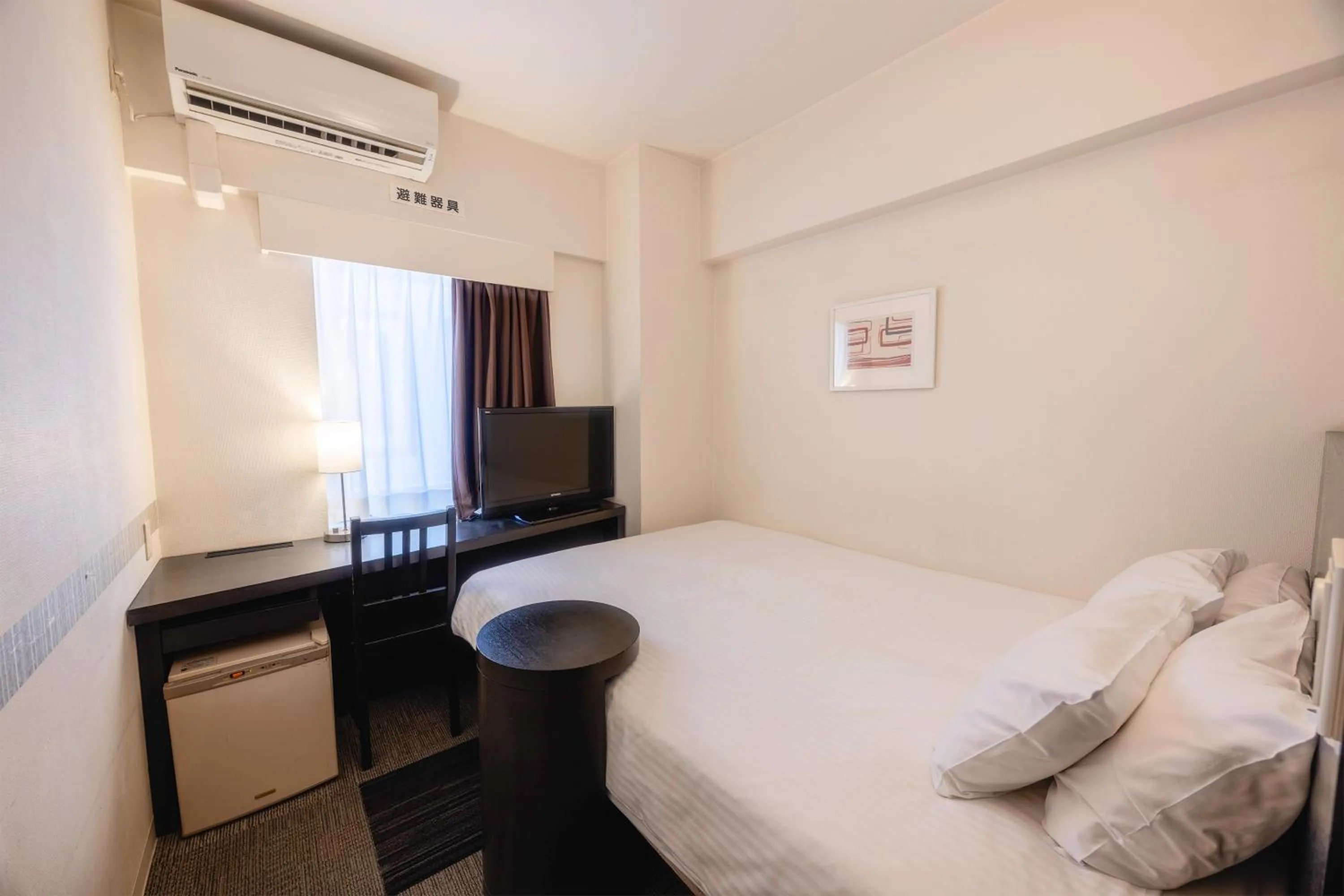 Bed in KOKO HOTEL Yokohama Tsurumi