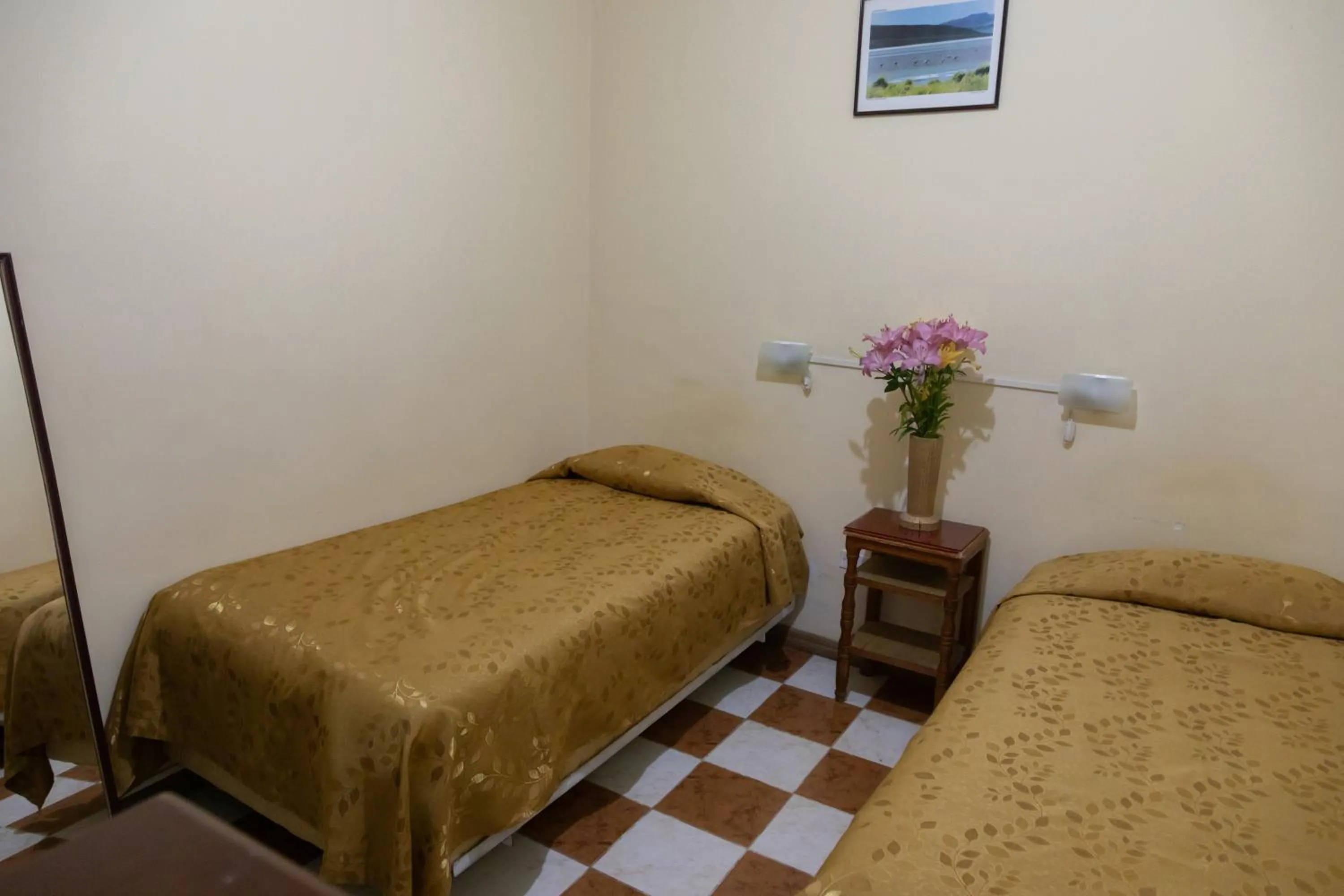 Bed in Julia Plaza Hotel