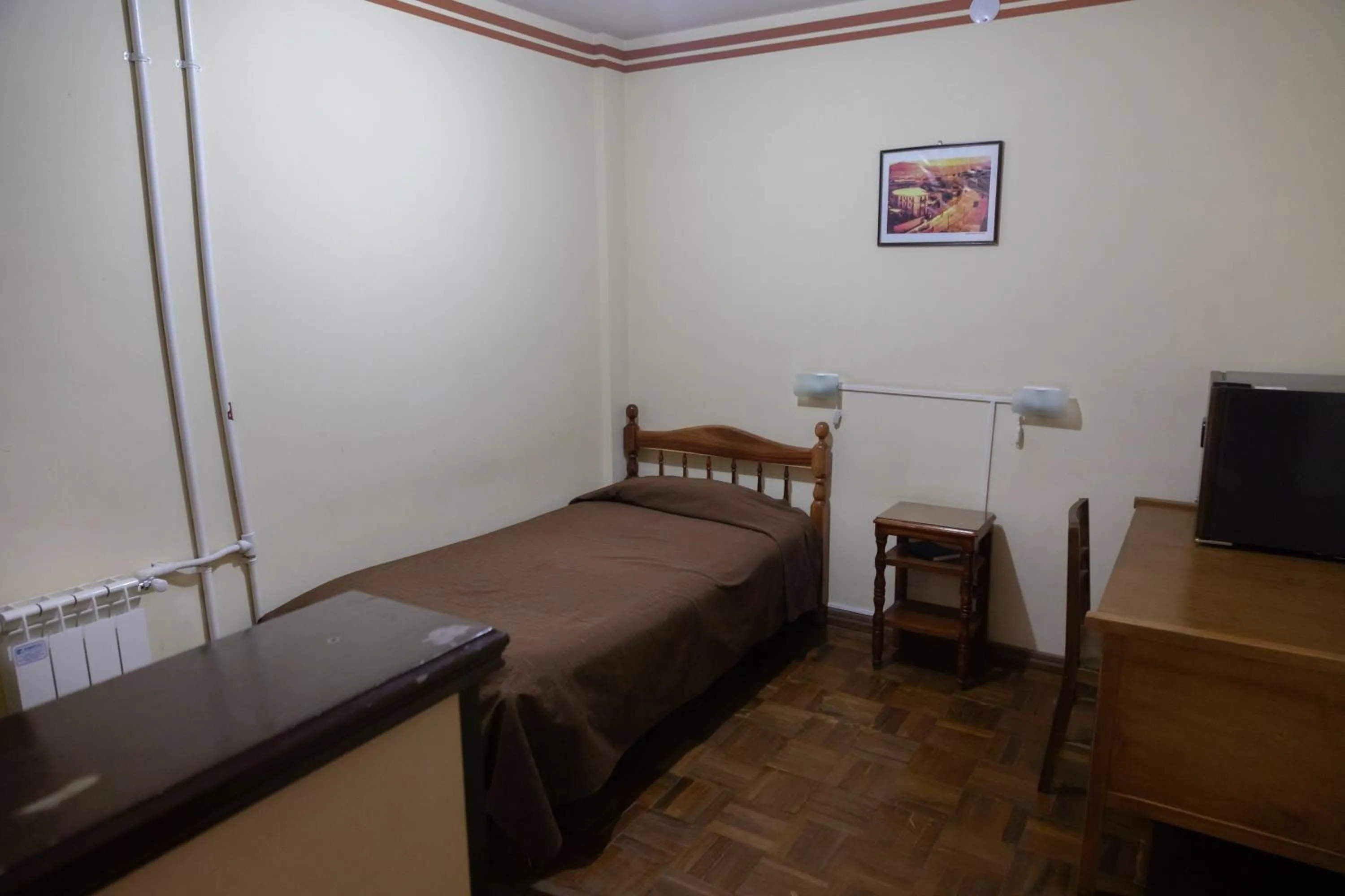 Bed in Julia Plaza Hotel