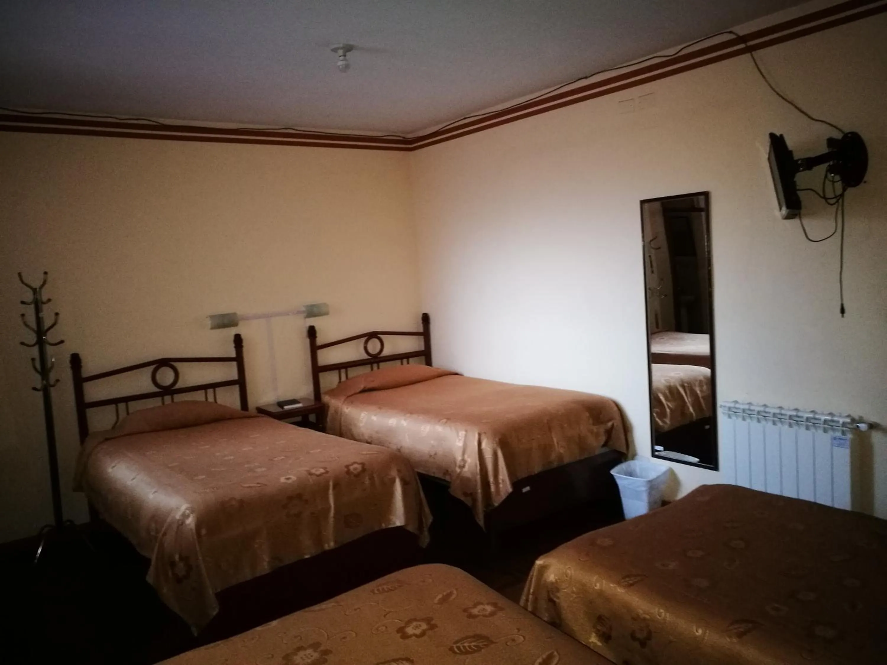 Bed in Julia Plaza Hotel