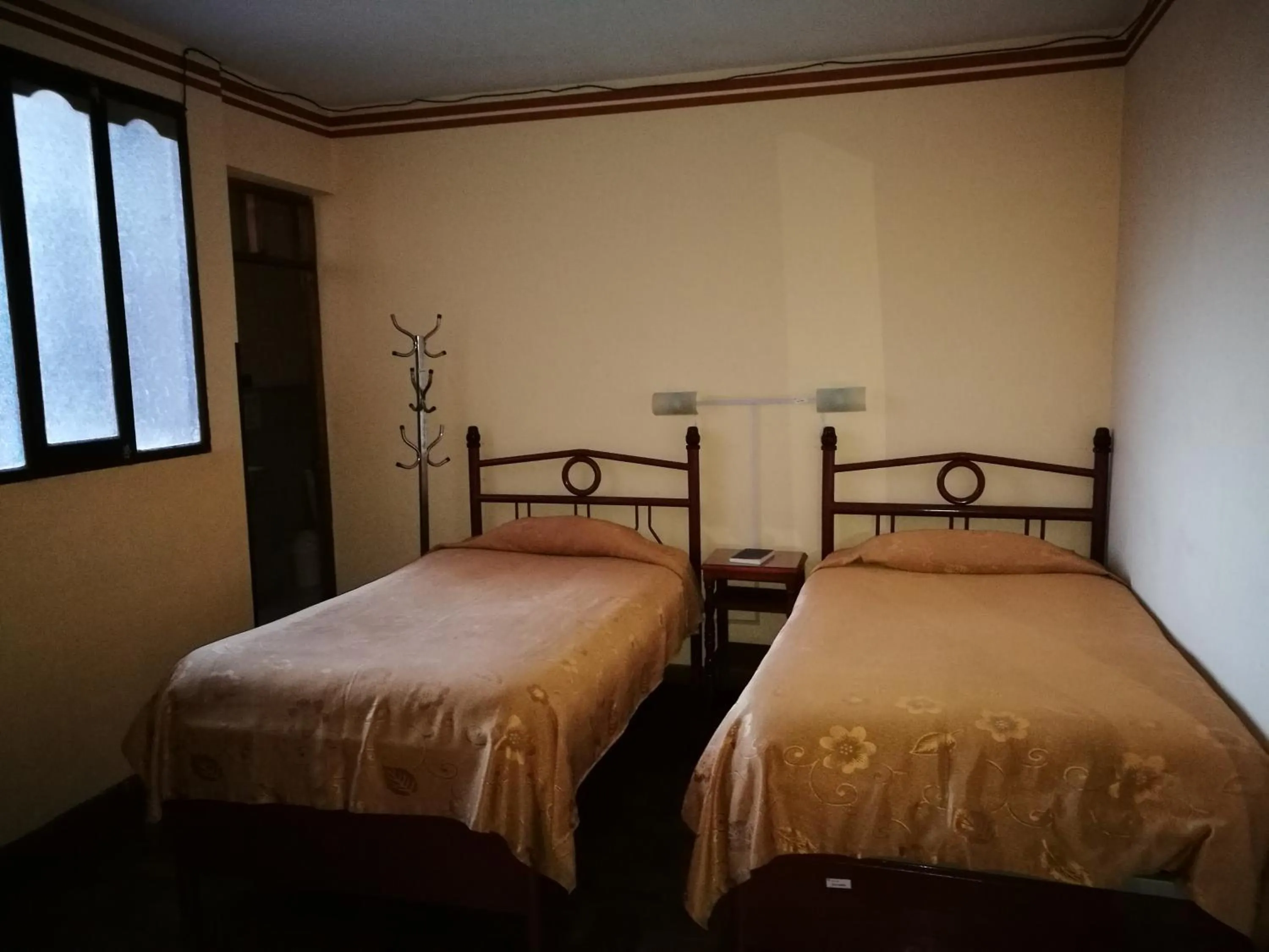 Bed in Julia Plaza Hotel