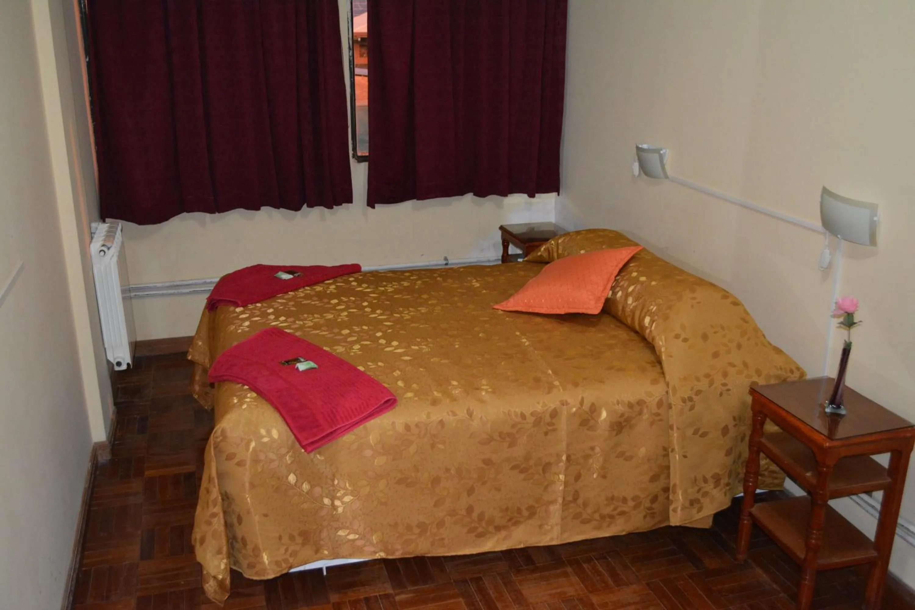 Bed in Julia Plaza Hotel