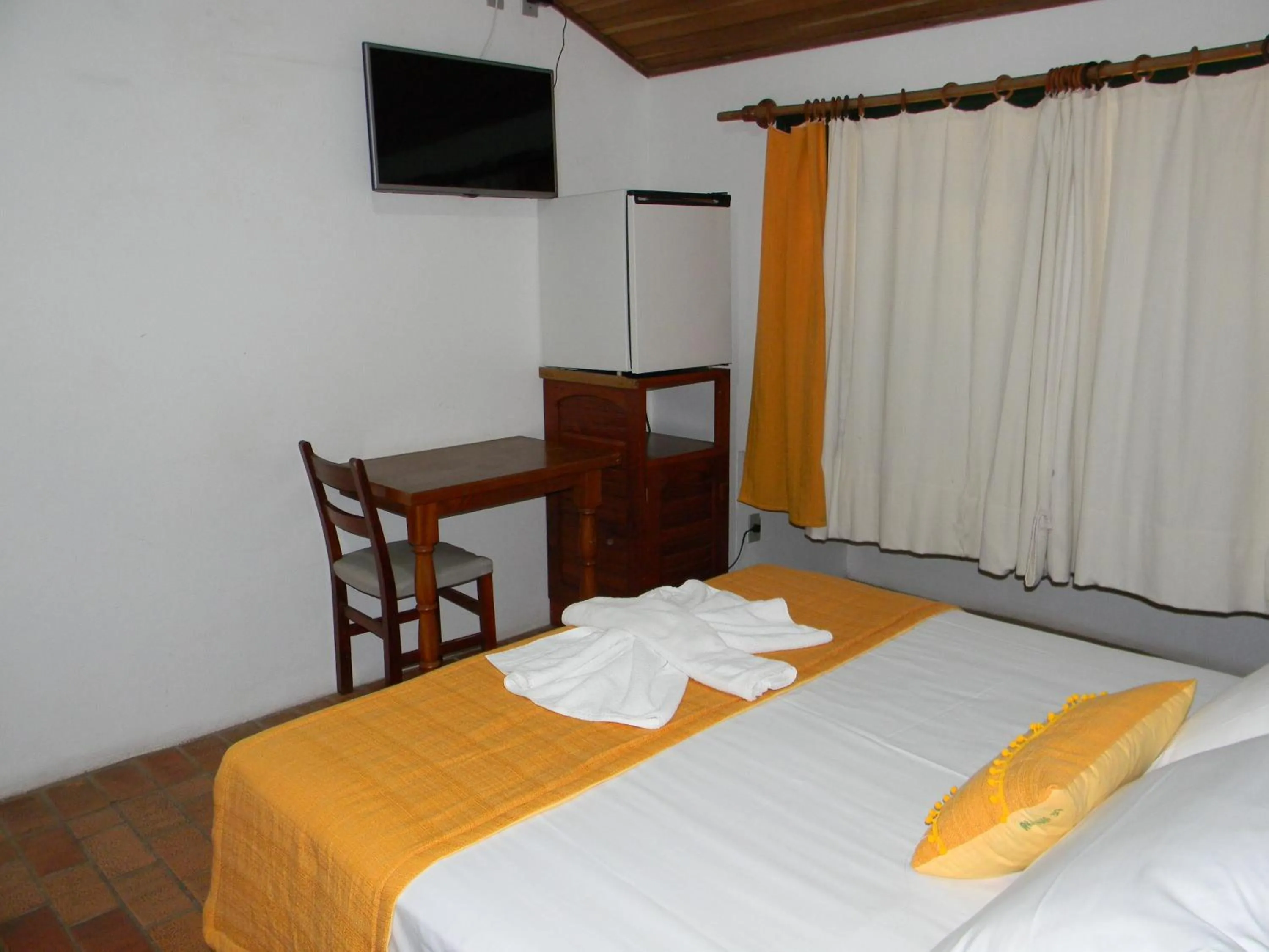 Bed in Pousada Recanto da Prainha